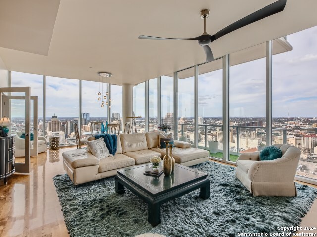 Prized corner unit with spectacular views of the Riverwalk and Hemisfair Civic Park.  Floor to ceiling windows offers sunset views over downtown San Antonio.  This condominium has been beautifully updated with incredible taste! Take a tour via the attached 3-D Virtual Tour.  Updates include new counters/back splash in kitchen, modern fireplace wall offering contemporary warmth to the living room, French doors to the study create a third flex room, large walk-in shower, new paint throughout and new carpets in bedrooms/study.   Appointed with luxury wood flooring, island kitchen with Sub-Zero refrigerator, Bosch stainless appliances, built-in cabinet organizers and gas cooking.  Primary suite has large customized walk-in closet, primary bathroom with double vanities and huge walk-in shower.  2 private parking spaces convey.   Luxury lifestyle amenities include 24-hour concierge, business center, 2 secured garage parking spaces, conference room, newly renovated interior common areas include new carpet, paint, lighting in hallways and refurbished 32nd floor private pool, outdoor dining, hot tub and pool lounge - a $1.2 million renovation. Alteza residents are just an elevator ride to the famous Riverwalk, Hemisfair Park and an array of dining, shopping and museums and cultural events. You will love the vibrant lifestyle of Alteza!