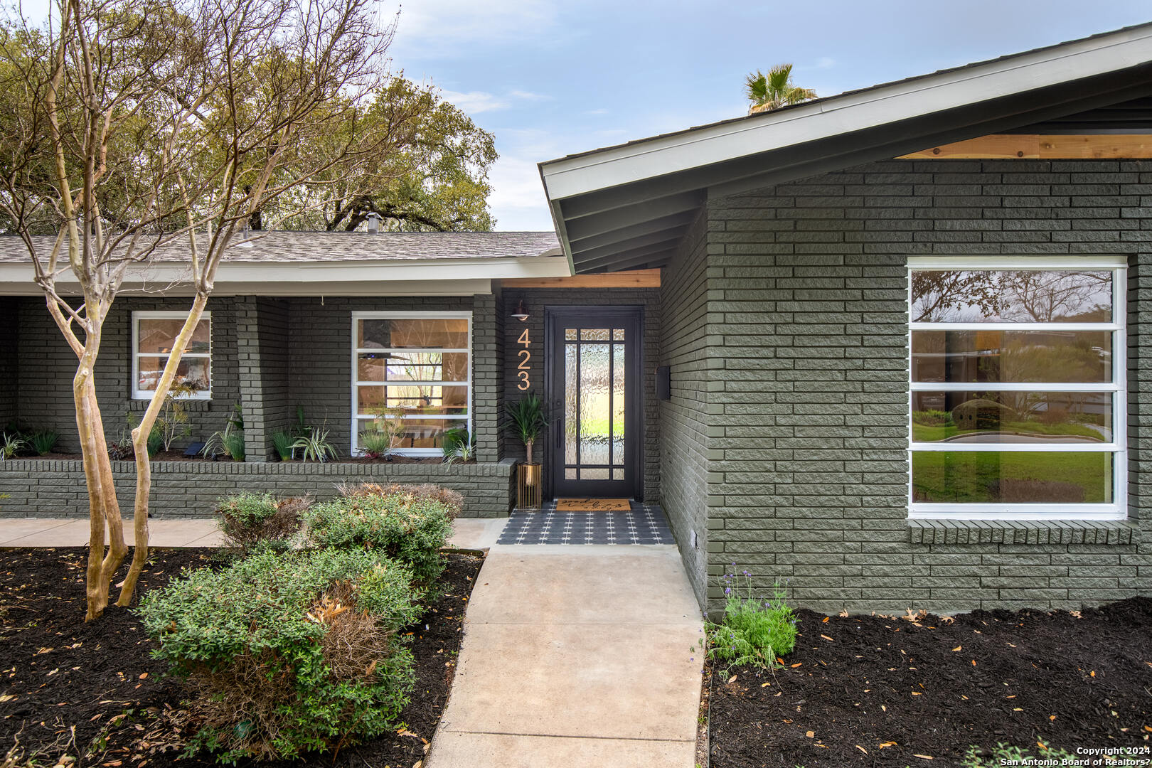 **OPEN HOUSE: Thu 3/28, 3pm-6pm, Fri 3/29, 3pm-6-pm, Sat 3/30, 1pm-4pm** Impeccably renovated, this sanctuary awaits on a picturesque Northwood street.  Every detail speaks of thoughtful design, from the luxury vinyl flooring to the bespoke two-tone cabinets and lavish leathered granite and quartz countertops in the kitchen. Escape to the spa-like bathrooms featuring custom floating wood and granite vanities, alongside rainfall showers and meticulous tile accents. Seamlessly blending luxury with practicality, discover a dedicated office space and a generous game room for leisure. Step outside to the covered tiled patio and outdoor grilling area, offering a tranquil retreat. You'll be enamored by this custom curated home.