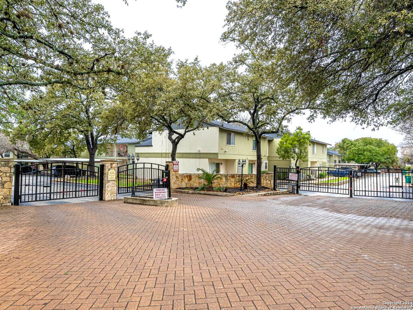 Don't miss out on this elegant top-floor newly updated 3 bedroom 2 full bath condo nestled in the highly desirable Alamo Heights neighborhood with award winning schools. This charming condo maximizes home safety, comfort, and carefree maintenance. Newly painted floors, ceilings, cabinets and doors.  Kitchen includes smooth top electric range, microwave, dishwasher, and refrigerator. The cozy kitchen and bathrooms have granite countertops, wood flooring, exquisite tile shower walls, and no carpet in the unit. The assigned covered parking space can be seen from the unit. Unit has a beautiful spacious balcony A short walk to cool off in the community pool for swimming days and outdoor living. Close to the Alamo Quarry, interstate highways, stores, restaurants, entertainment and more. This unit is perfect for a starter home, investment and is move-in ready.