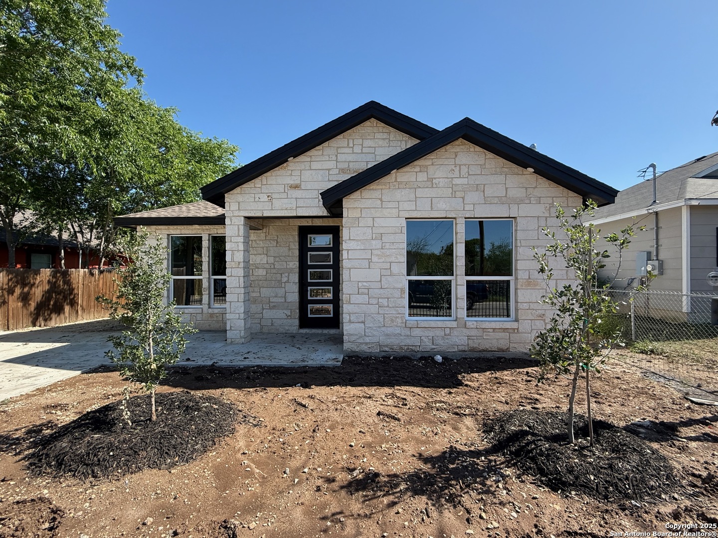 Step into modern comfort with this brand-new 3-bedroom, 2-bathroom home, designed for easy living. This one-story, no-step floor plan features sleek all-tile flooring and 8' interior doors throughout. The spacious primary suite offers a high ceiling and a spa-like walk-in shower, while the kitchen and bathrooms are finished with solid countertops for durability and style. Perfectly located just minutes from Lackland AFB and under 15 minutes to downtown, this home combines style, accessibility, and unbeatable convenience.