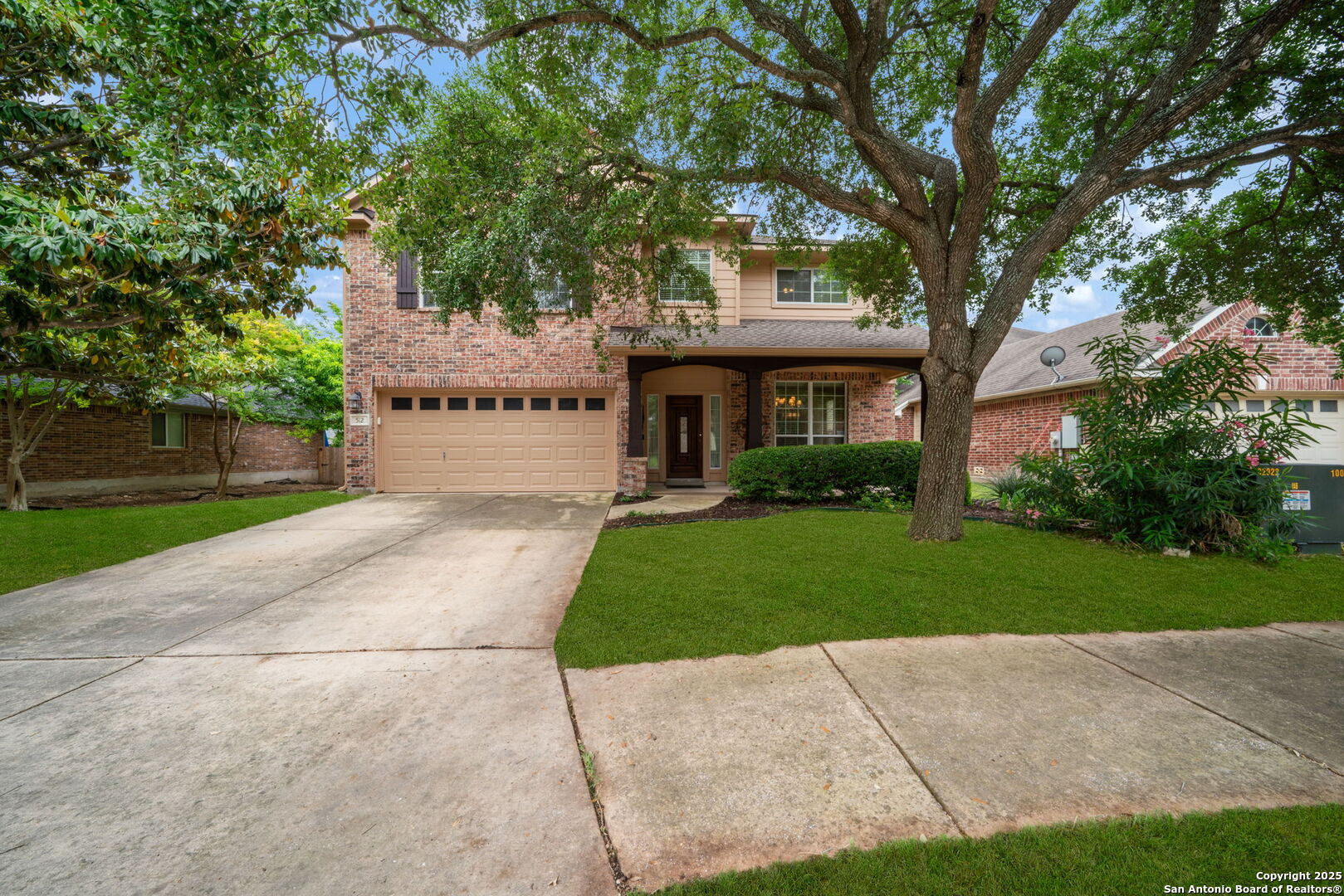Welcome to 512 Thoreau Trail, a spacious and beautifully maintained 4-bedroom, 3-bathroom, 2-car garage home nestled in the highly sought-after Jonas Woods community in Schertz, Texas. With 2,788 square feet of thoughtfully designed living space, this home offers comfort, flexibility, and style. Step inside to an inviting, mostly open floor plan, featuring a formal dining room with French doors, which could also be used for a home office or study. The heart of the home, the kitchen, is perfect for both cooking and entertaining with its elegant granite countertops, a breakfast bar, and a cozy breakfast nook, flowing seamlessly into the family room with a charming wood-burning fireplace perfect for when the winter finally returns. The first floor features a private bedroom and a full bathroom, ideal for guests or multigenerational living. Upstairs, you'll find a large game room with soaring ceilings that provides the perfect space for entertaining or relaxing. There are also three additional bedrooms, including a luxurious primary bedroom with a walk-in closet complete with an island, en-suite bath featuring dual sinks/vanities, a soaking tub, a separate shower, and a linen closet. Tile flooring extends throughout the main living areas, while the game room and bedrooms offer comfy carpeting. Enjoy outdoor living with a beautifully covered front porch, manicured and landscaped front yard with mature trees. Also enjoy a generously sized backyard perfect for BBQ's and surrounded with a privacy fence. Residents of Jonas Woods enjoy fantastic neighborhood amenities such as a swimming pool, clubhouse, park, playground (conveniently located across the street), with jogging and walking trails. Plus, you're just minutes from local dining, shopping, major highways and Randolph Brooks Air Force Base.  Don't miss your opportunity to make this wonderful home yours.  Schedule your private showing today!!!