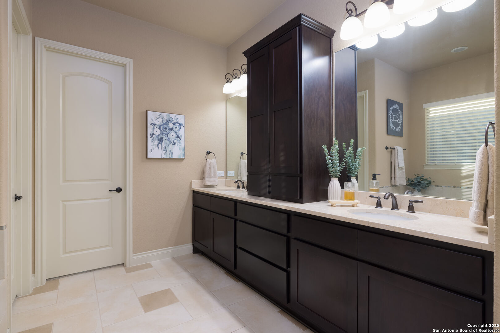 Primary Bathroom with Split Vanities on 1st Floor
