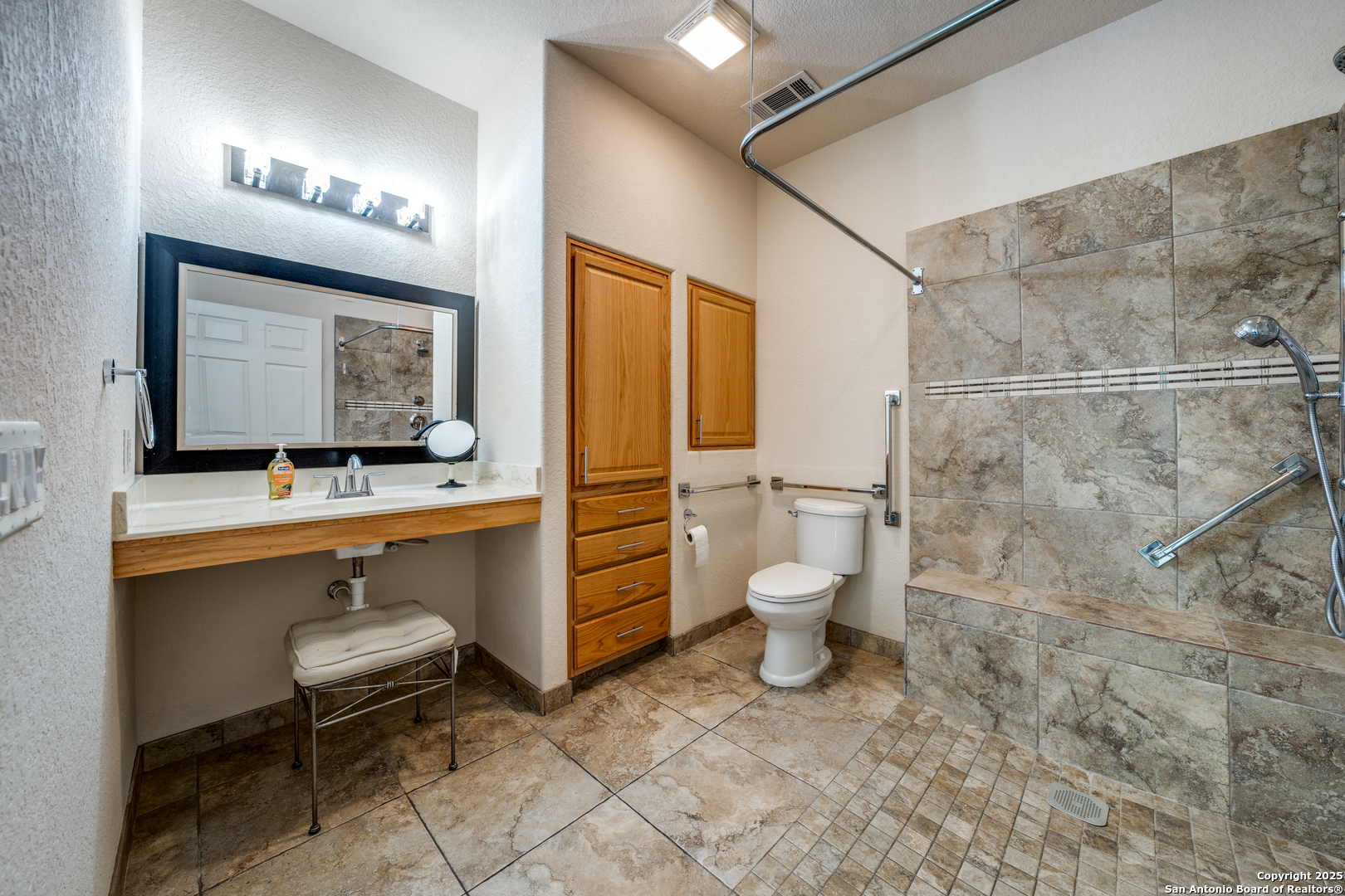 Accessible roll-in shower, wide vanity