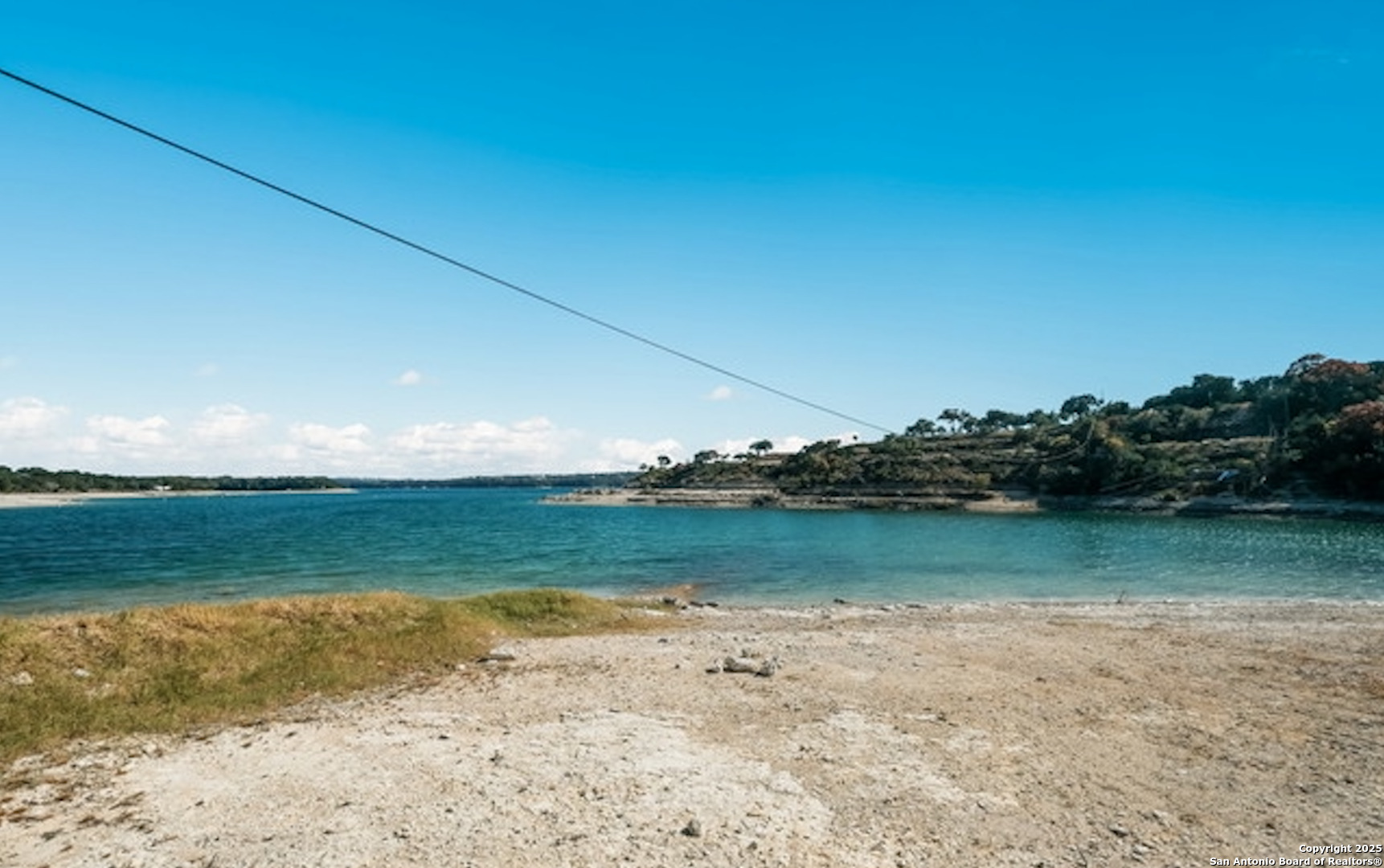 When Medina Lake is full across the road from the 