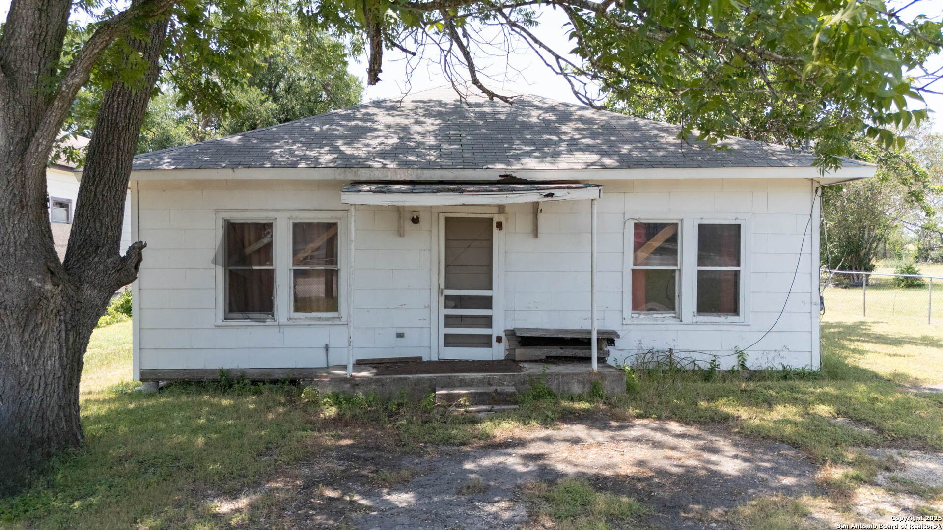 House to the right of the Carport