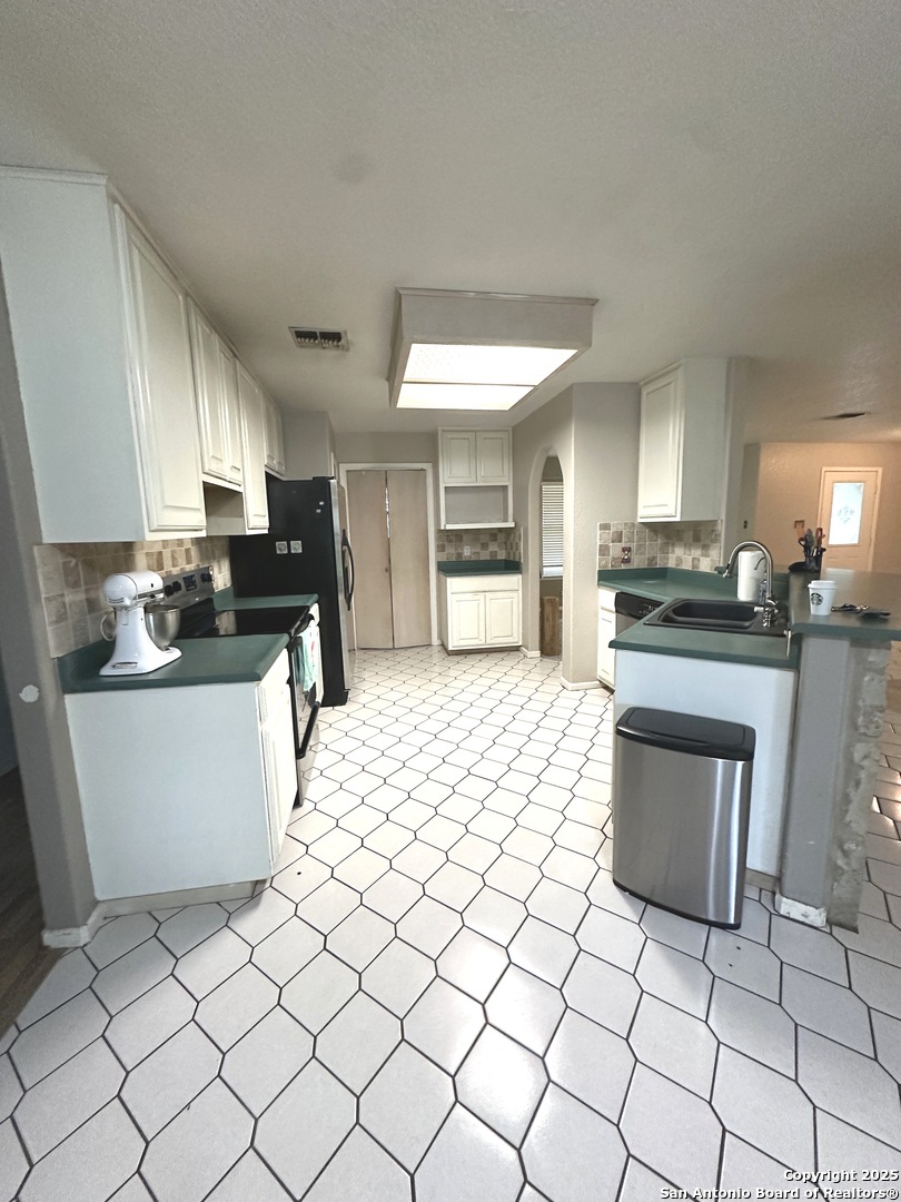 kitchen view from breakfast nook area