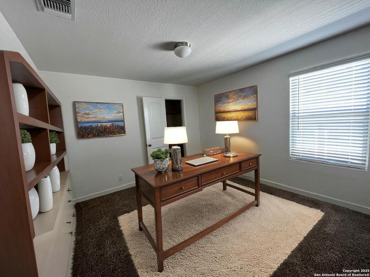 virtually staged upstairs loft or second office