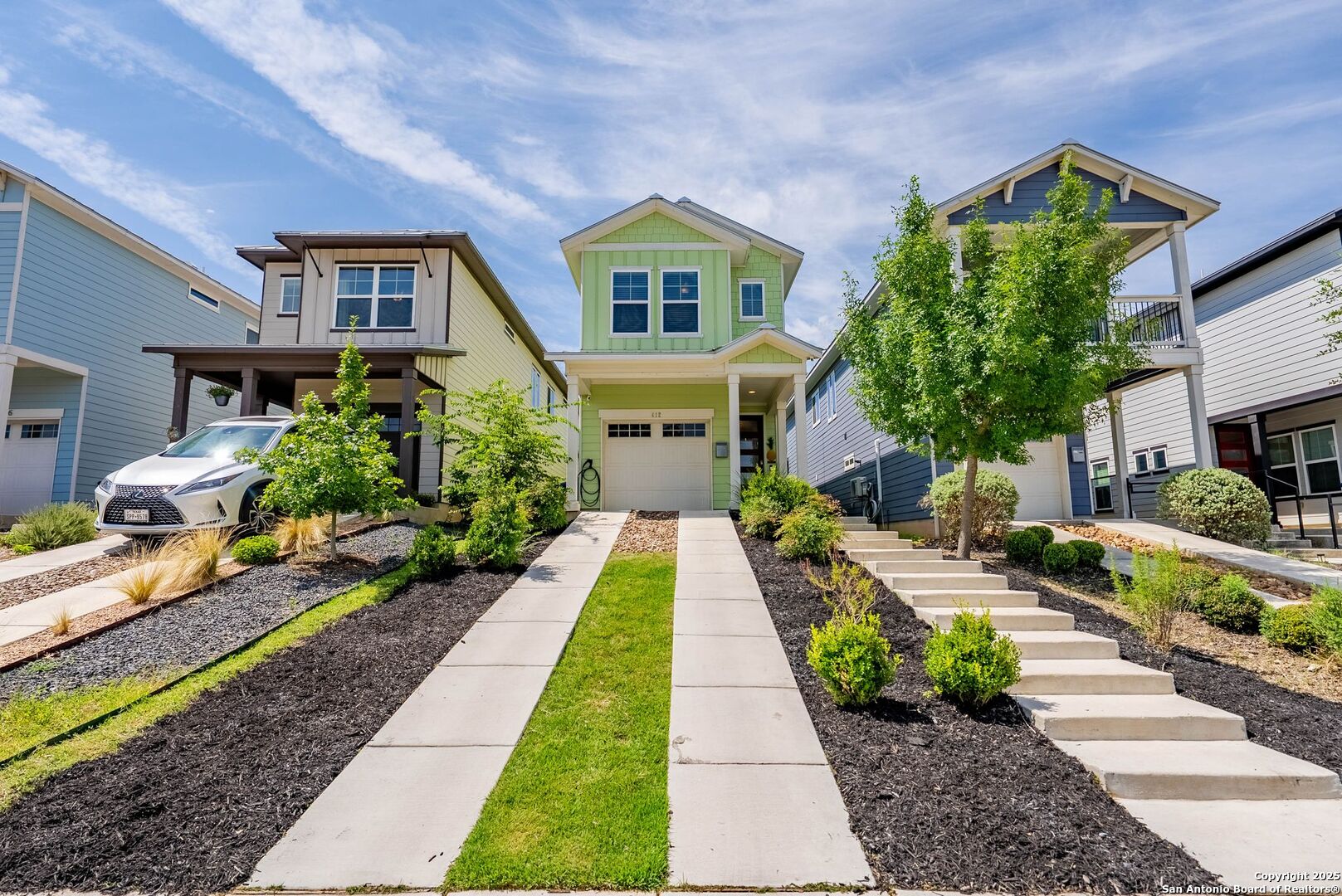 Looking for the charm of a historic district with the comfort of a newer home?  Welcome to 412 Natalen Ave, located in the vibrant Mahncke Park community. Built in 2018, this 3-bedroom, 2.5-bath residence offers over 1,800 sq. ft. of thoughtfully designed living space, including a climate-controlled Florida room perfect for year round enjoyment. This home is packed with modern upgrades, including a durable metal roof, spray foam insulation, recessed lighting, Low-E double pane windows, solar panels, an electric car charger outlet in the garage, and Energy Star appliances for energy efficiency and savings. Inside, you'll find wood flooring throughout most of the home (no carpet), making it ideal for pets and easy to maintain. The floor plan is just as functional as it is stylish, featuring a walk-in pantry cleverly tucked under the staircase and built-in shelving in the utility room.  The home's design details stand out with an 8-ft front door, floor to ceiling glass sliders opening to the Florida room, and striking white cabinetry that extends to the high ceilings in the island kitchen. Upstairs, the views from the bedrooms, especially the primary suite, are truly something to appreciate. The primary suite features a spacious walk in closet and a glass enclosed shower. The exterior showcases drought tolerant landscaping, mulch beds, and a full sprinkler system as an efficient and low maintenance approach. While this home provides every reason to stay in, Mahncke Park's location will have you exploring in no time. Enjoy nearby attractions such as Brackenridge Park, the San Antonio Botanical Garden, the San Antonio Zoo, the Witte Museum, The DoSeum, and The Pearl. Local coffee shops, eateries, and H-E-B's Central Market add to the neighborhood's undeniable charm. With 412 Natalen Ave, you're not just buying a home, you're joining a welcoming and vibrant community.