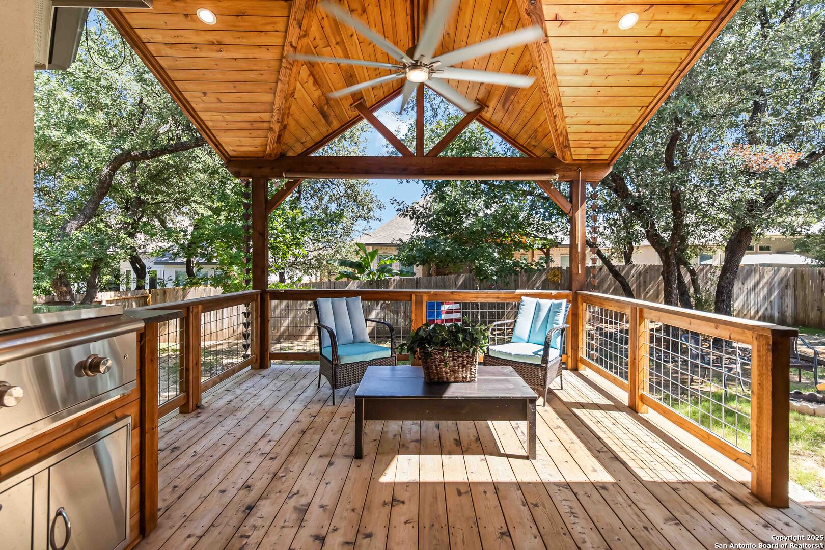 Fabulous extended deck with wood-slat ceiling