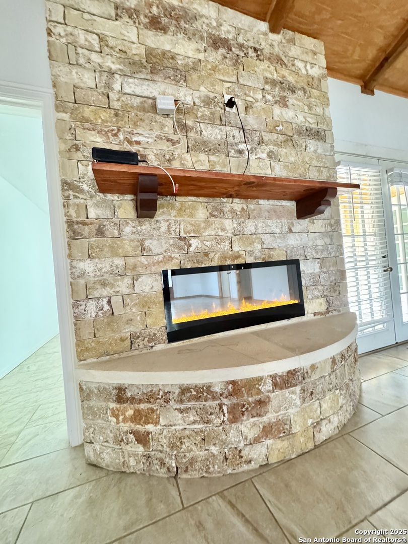 Real stone faux fireplace.