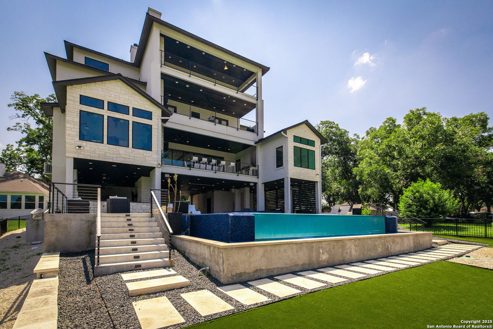 Over 2400 sqft of covered patio on ground floor