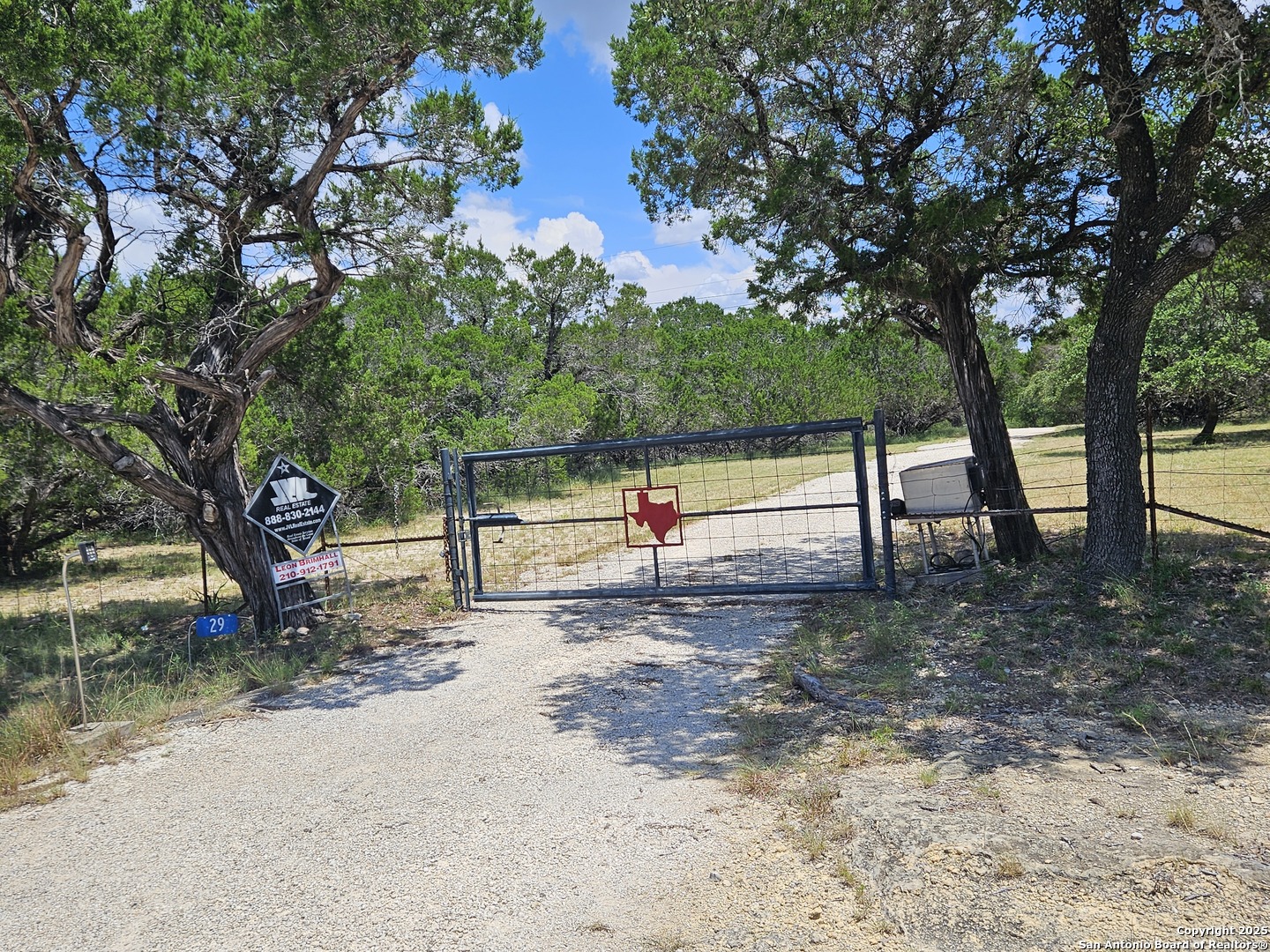 Front Gate Entrance Gravel Road