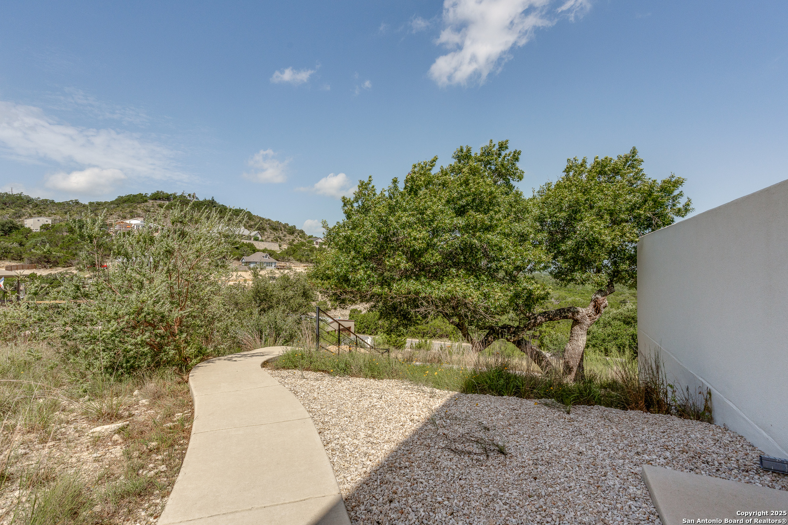 Stairs to the home. Walk up home.