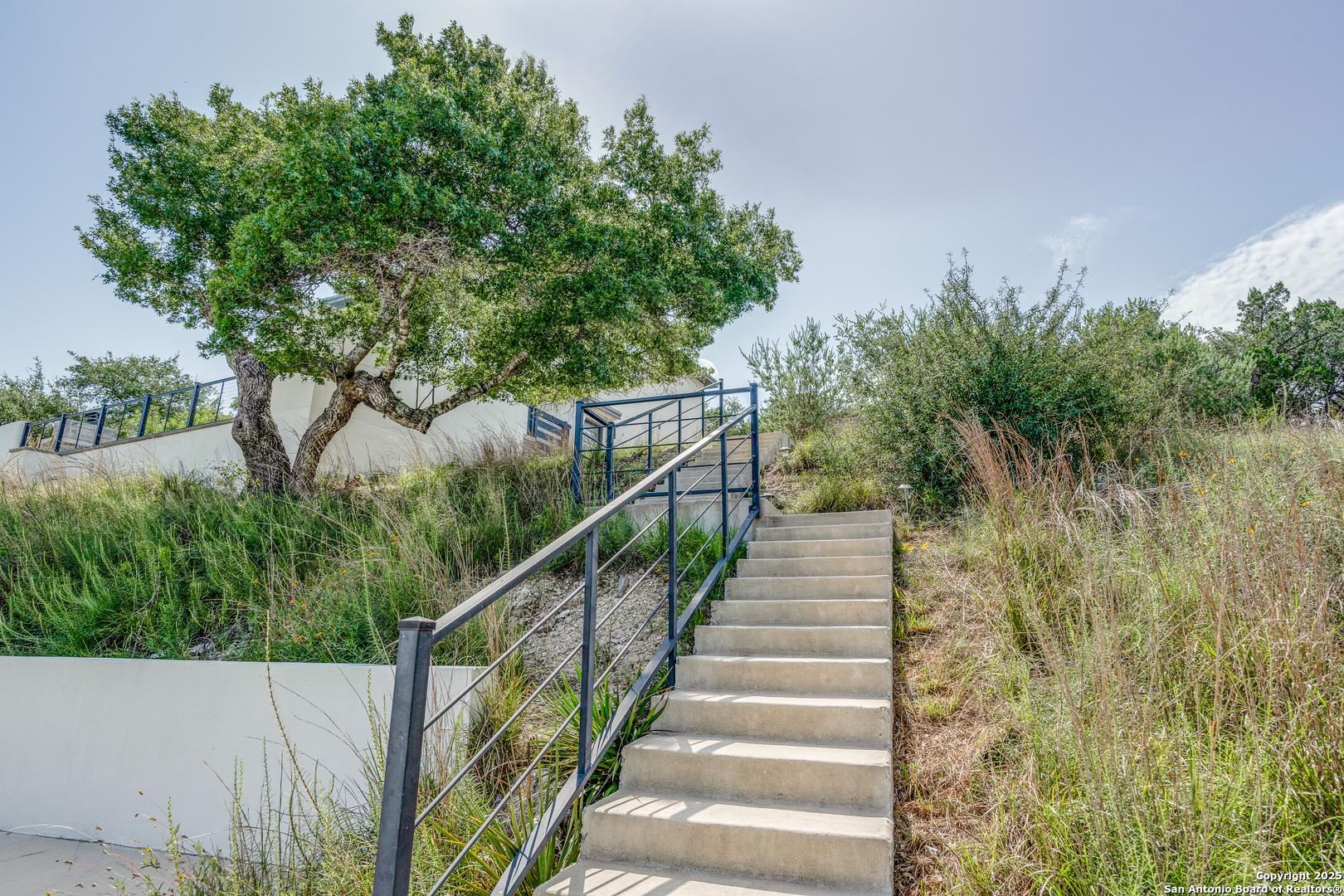 Stairs to the home. Walk up home. 