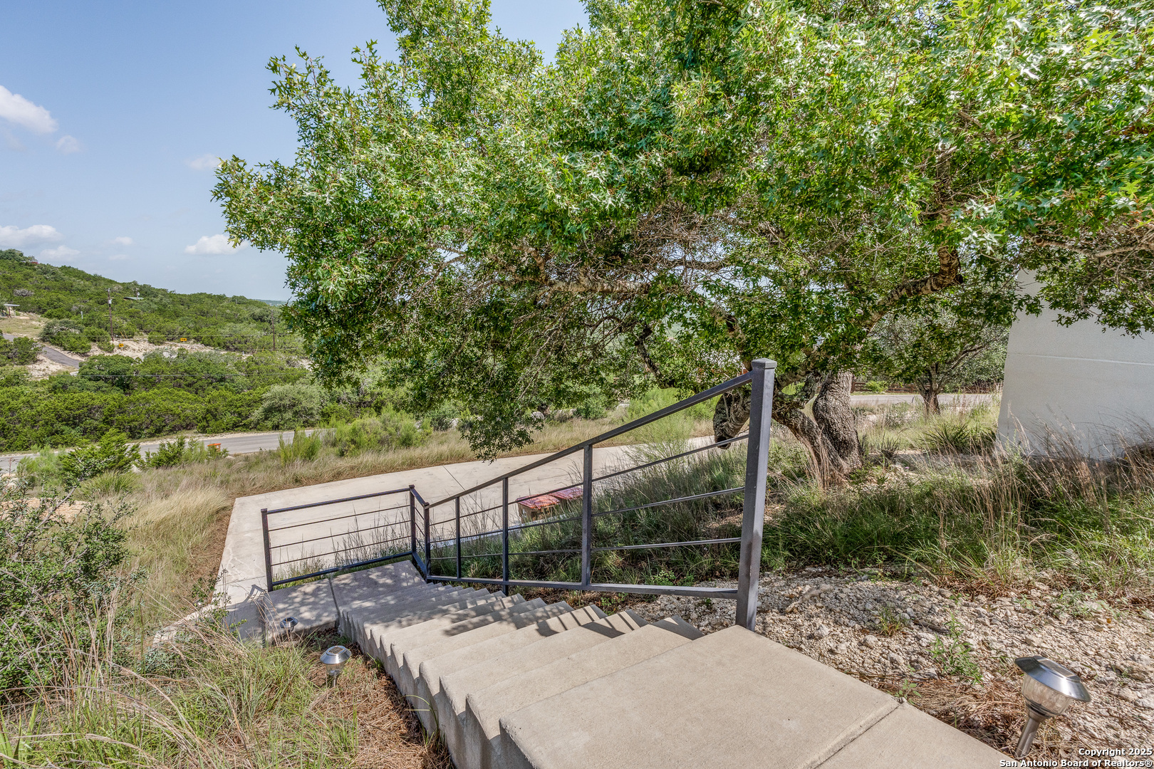 Stairs to the home. Walk up home.