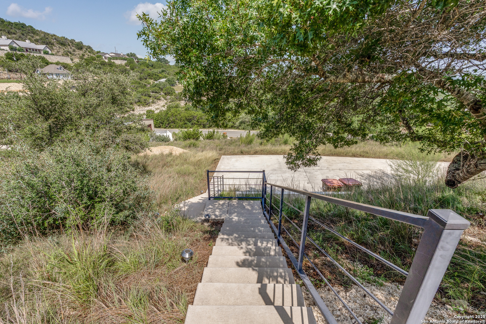 Stairs to the home. Walk up home.