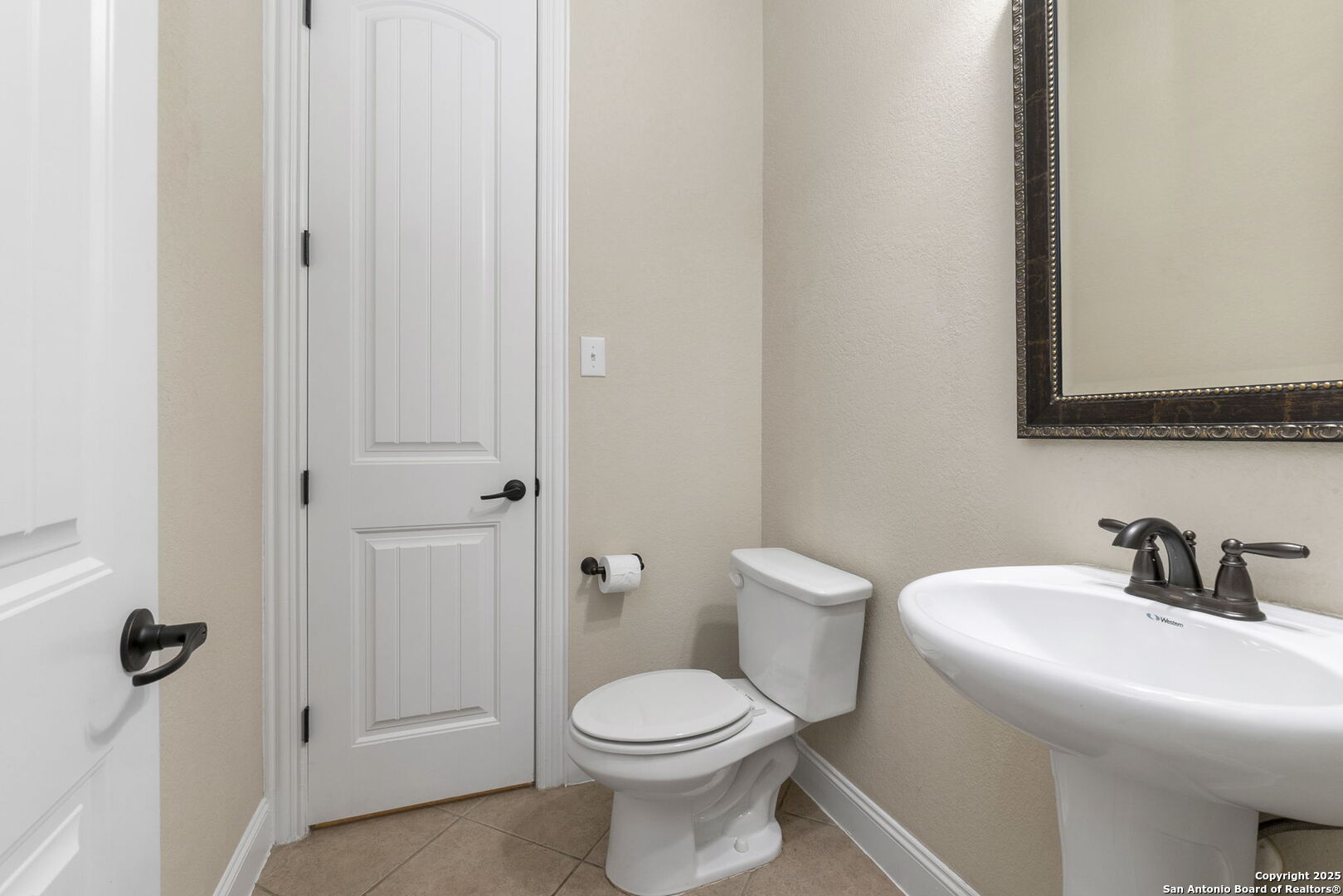 Powder Room off Mud Room