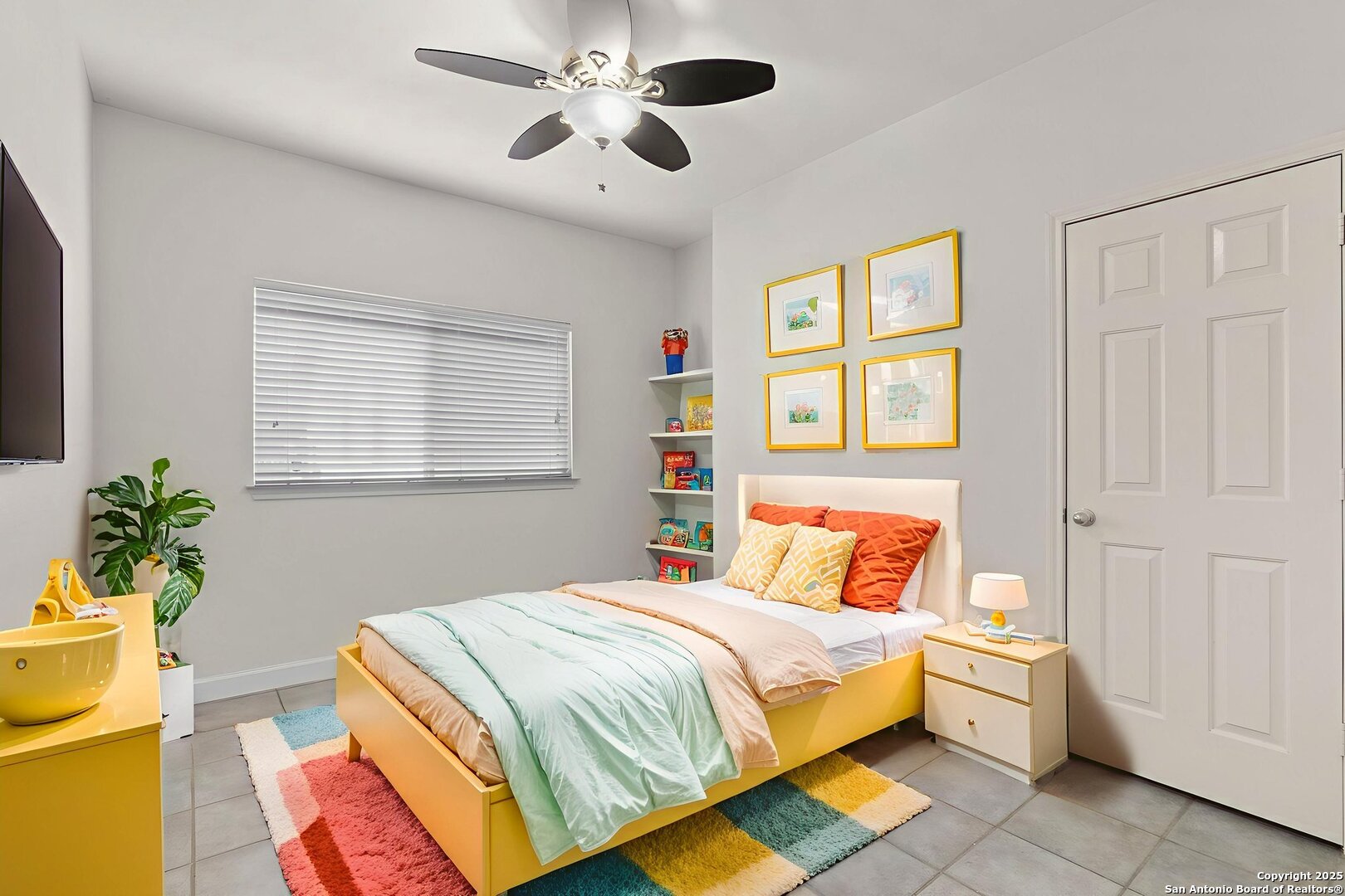 Bedroom 2 with built-in shelves (alternate view)