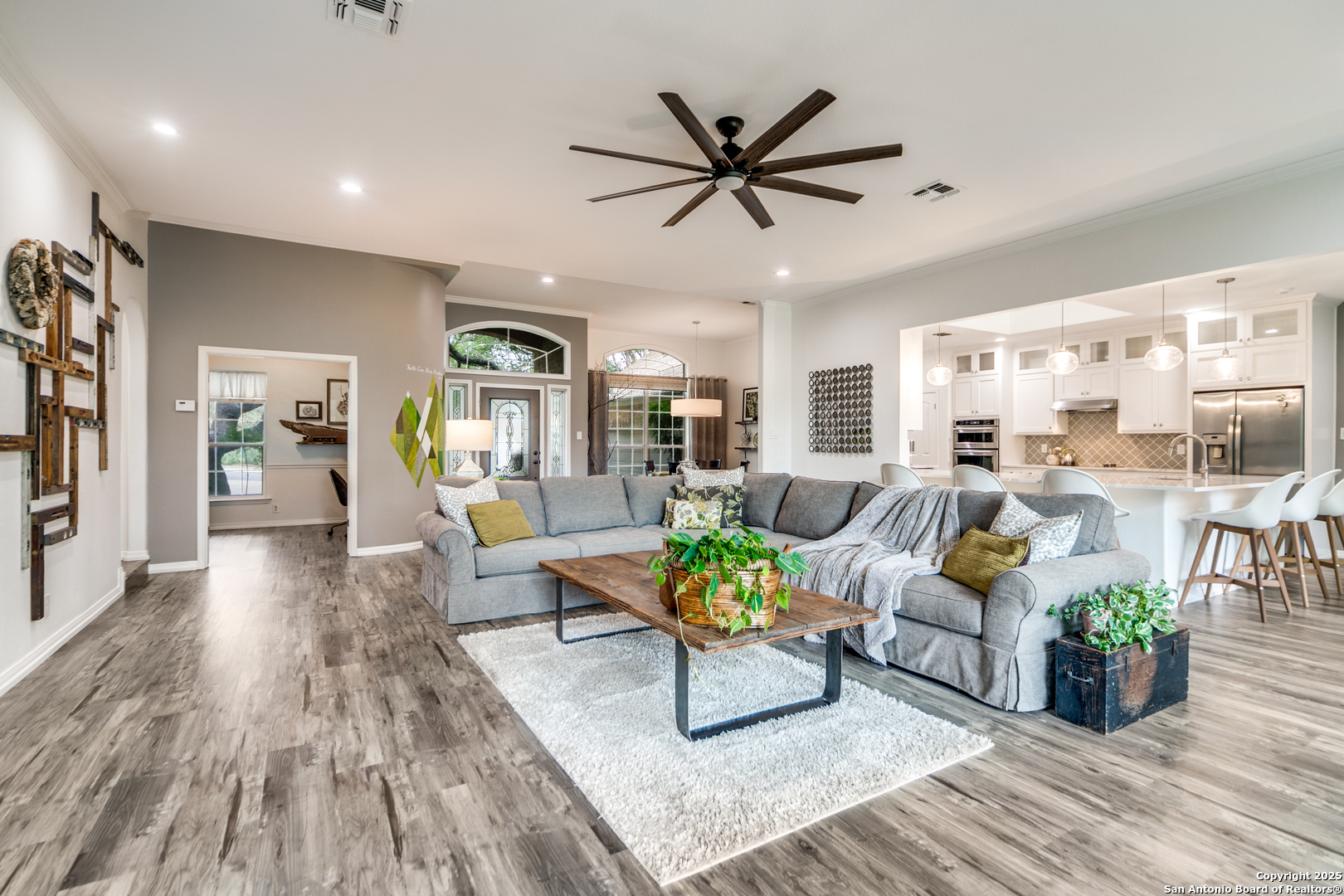 Open concept living, kitchen, dining, and breakfas