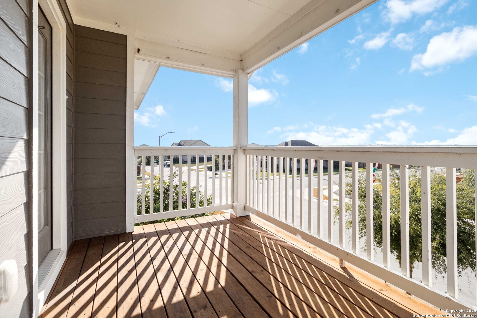 Deck off of front of house