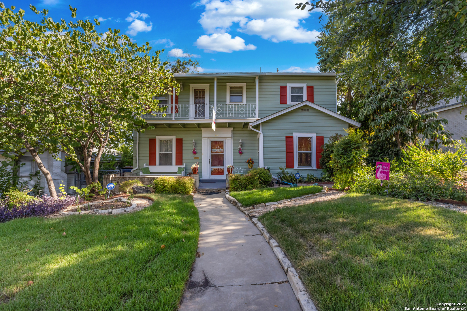 Step into timeless charm with this inviting two-story home located in the heart of San Antonio's Beacon Hill neighborhood. From the welcoming front porch to its vintage details, this residence blends classic character with modern updates, featuring original hardwood floors, crown molding in the living and dining rooms, a cozy living room with a fireplace, and spacious living areas filled with warmth and versatility. The updated kitchen offers sleek cabinetry, stainless steel appliances, stylish finishes, crown molding, and a unique decorative metal ceiling that adds character and elegance, while multiple bedrooms and a wood-paneled study with built-ins provide comfort and function. A convenient half bath is located downstairs for guests. Adding even more value, the property includes a guest/back apartment with full plumbing-a 1 bed, 1 bath living space perfect for extended family, rental income, or a private office-that can also be converted back into a garage if desired. Outdoors, mature landscaping, garden space, and private areas for relaxing or entertaining are enhanced by a patio with two ceiling fans and a barbecue area, making it ideal for year-round gatherings. This unique opportunity offers a blend of Beacon Hill charm with modern-day convenience.