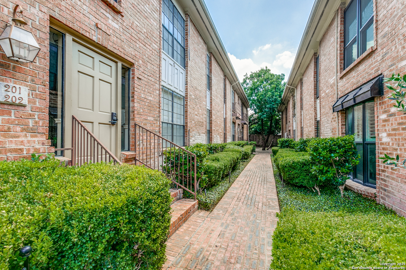 Look no further for an updated, low-maintenance condo in Alamo Heights! Fresh paint, wood-look flooring, and a bright kitchen will impress anyone wanting an easy lock-and-leave lifestyle. The combined living and dining room is generously sized and has storage space for your entertaining needs. The kitchen was recently transformed with modern cabinetry, white counters and backsplash, stainless appliances and makes a cheery spot for cooking with eat-in space and laundry closet. Spacious bedrooms and refreshed baths with on-trend cabinets and tile. Private patio and 1 covered car space.