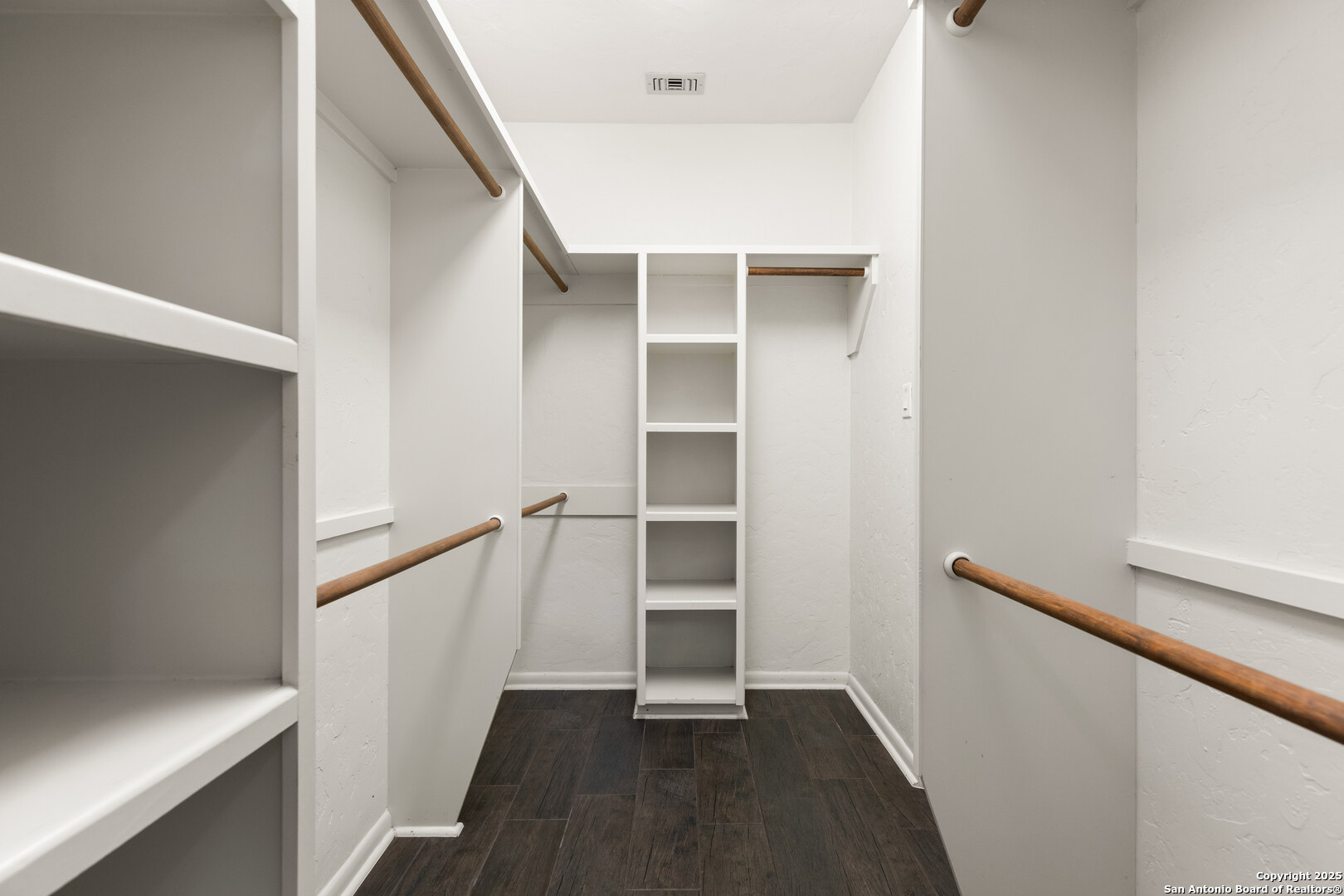walk in closet attached to bedroom on lower level