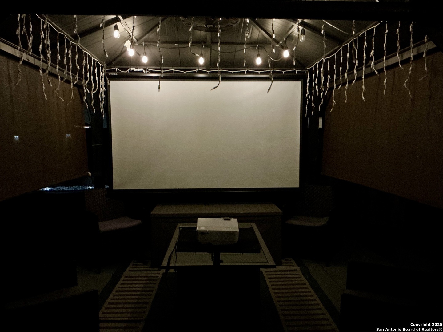 Pergola has retractable projector screen