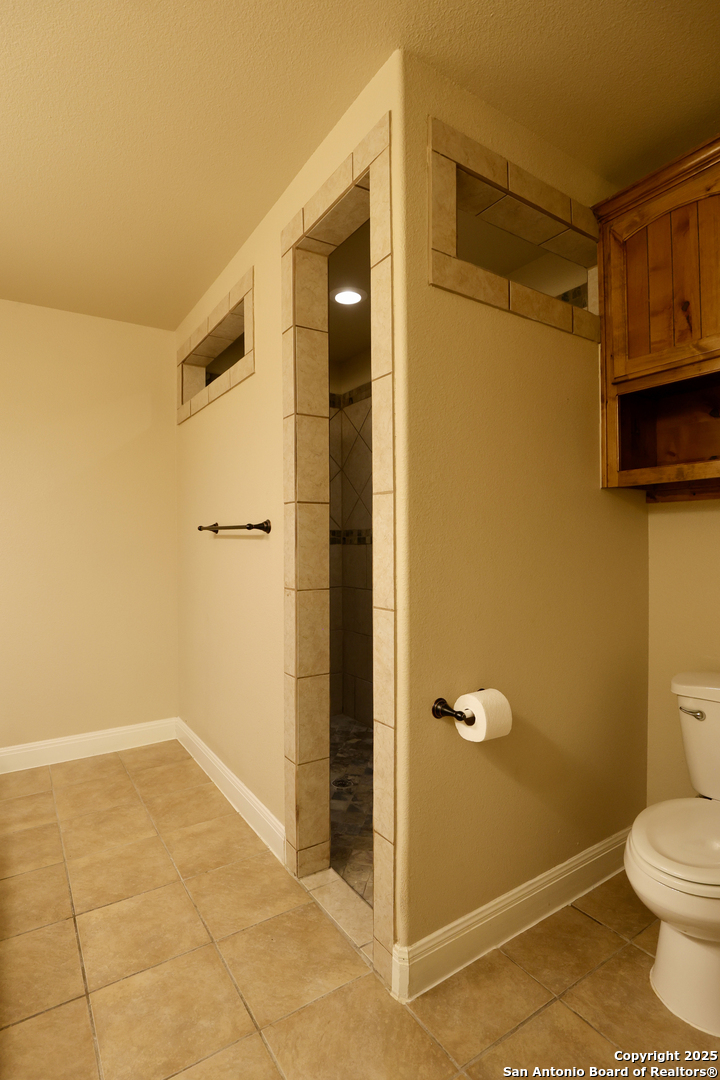Primary Bathroom - view w/primary closet at back