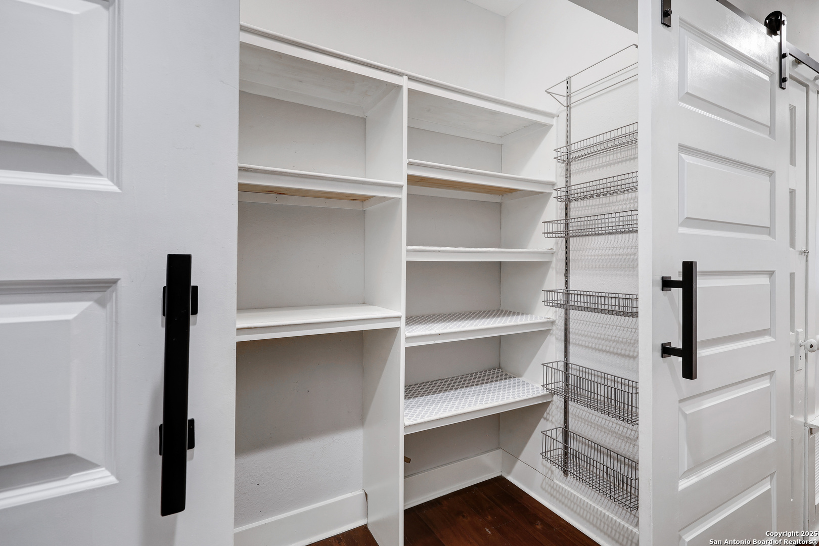 Incredible Barn door Pantry easy access to kitchen