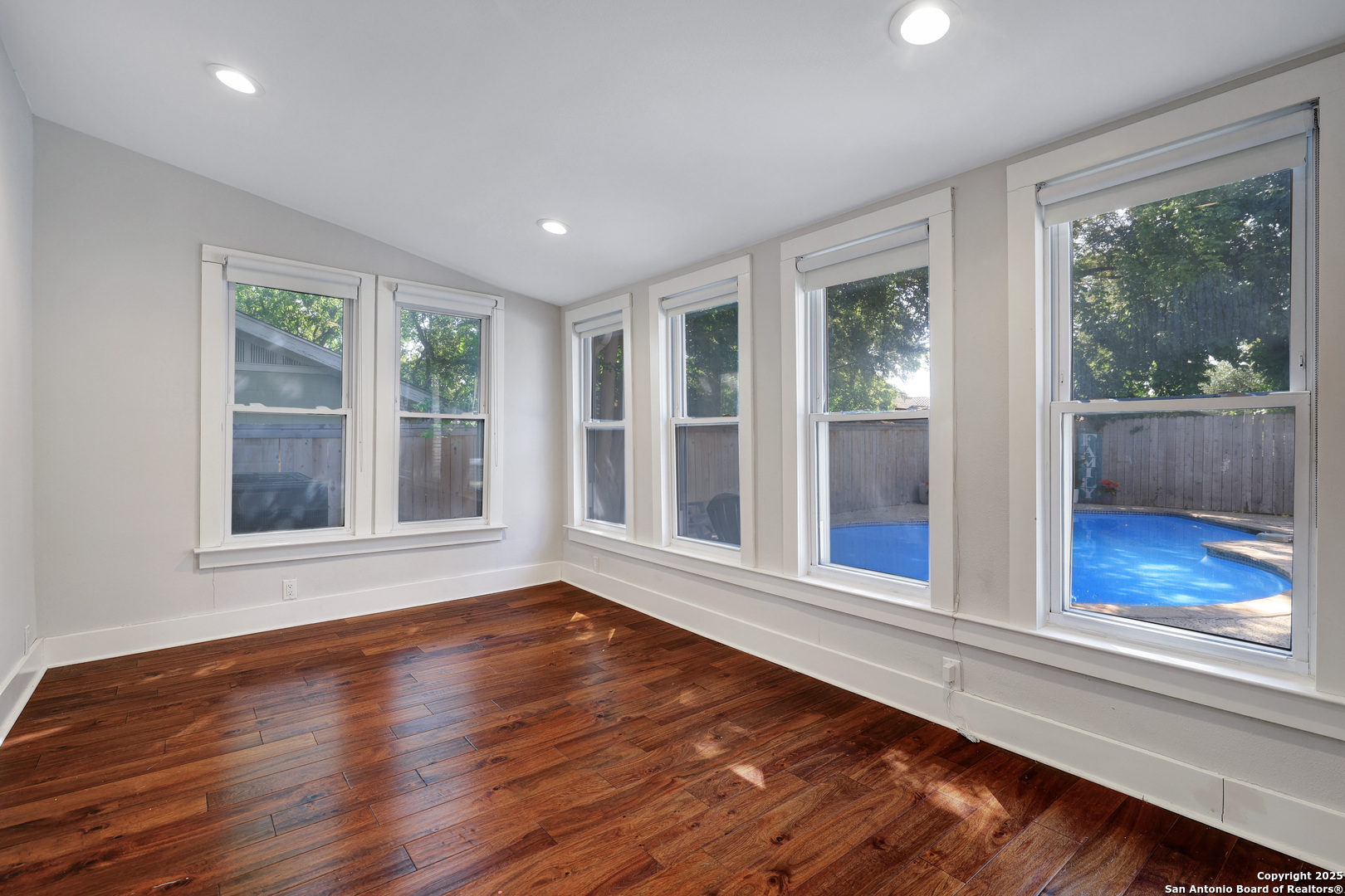 Polished sunshine could be exercise room or study.