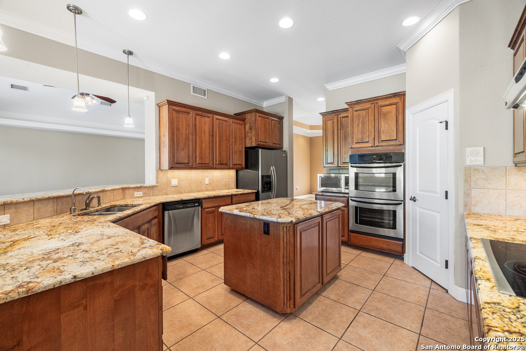 Kitchen features stainless steel appliances 