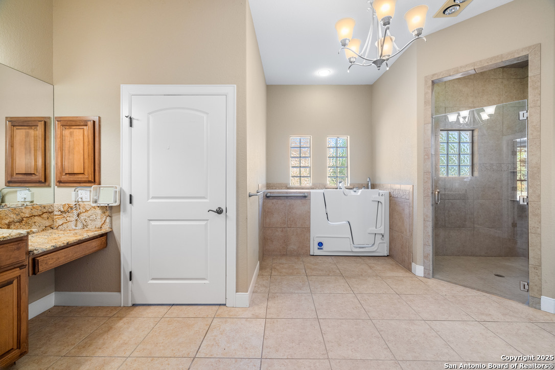 Primary bath; 2 vanities, large walk in shower