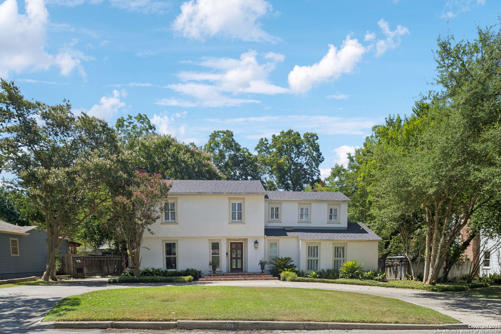 This spacious 5-bedroom, 4.5-bathroom home blends classic 1930s charm with a modern addition completed in 2000. Originally built in 1935, the house retains its character with period details like hardwood floors, original trim, and vintage touches, while the recent expansion offers updated living space, including a large first-floor primary suite and open-concept kitchen/family room area.  The main home offers a flexible layout perfect for families or entertaining, with generously sized bedrooms and multiple en-suite bathrooms. The 2000 addition adds functionality and room to grow, but the property still offers a great opportunity for further updates and personalization.  A detached garage sits behind the home and includes a workshop and storage room. With solid bones, ample space, and a sought-after mix of old and new, this home is ideal for buyers looking to invest in a unique property with character and potential.