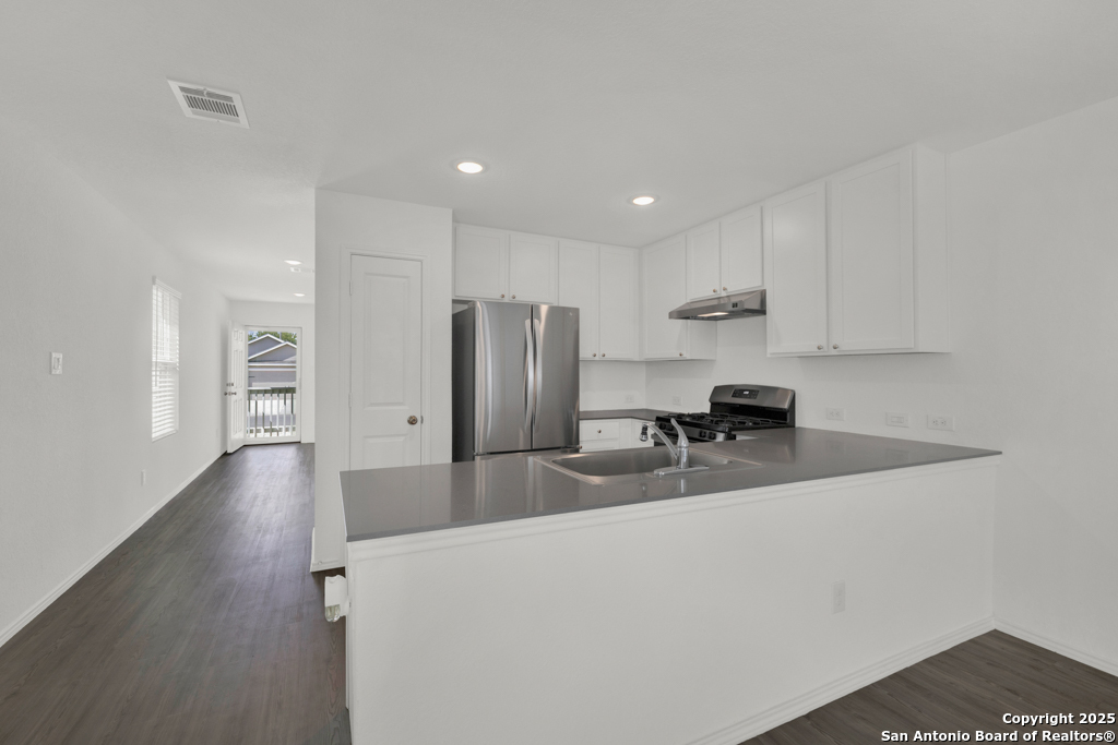 Kitchen offers stainless steel appliances.