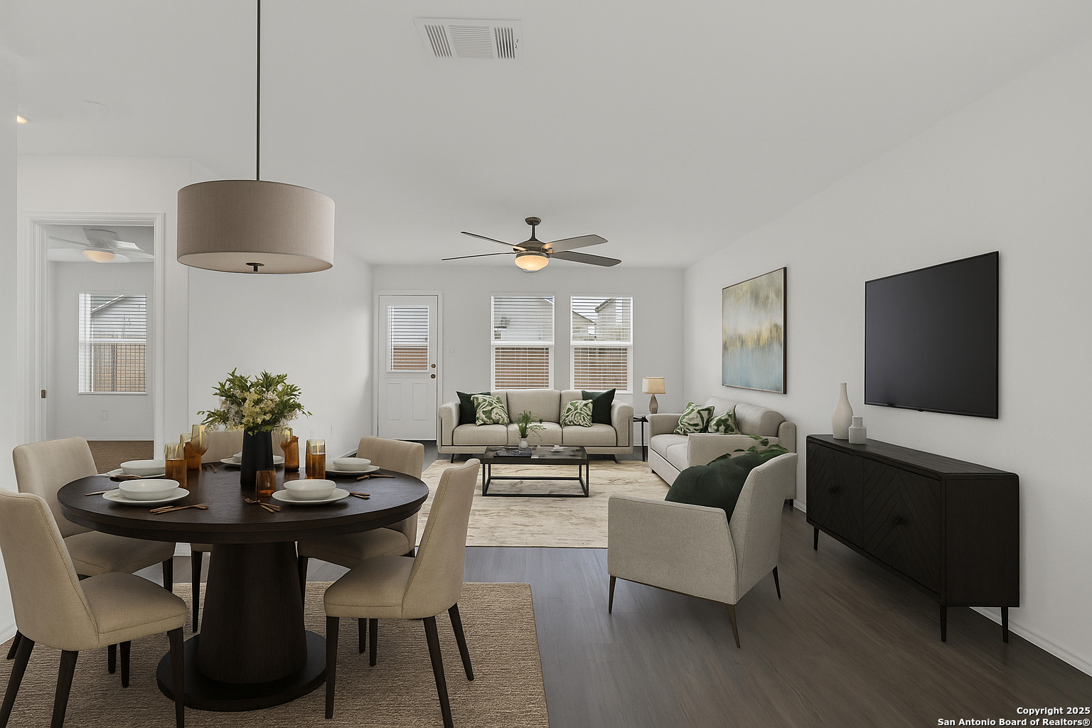 Virtually staged dining and living room.  