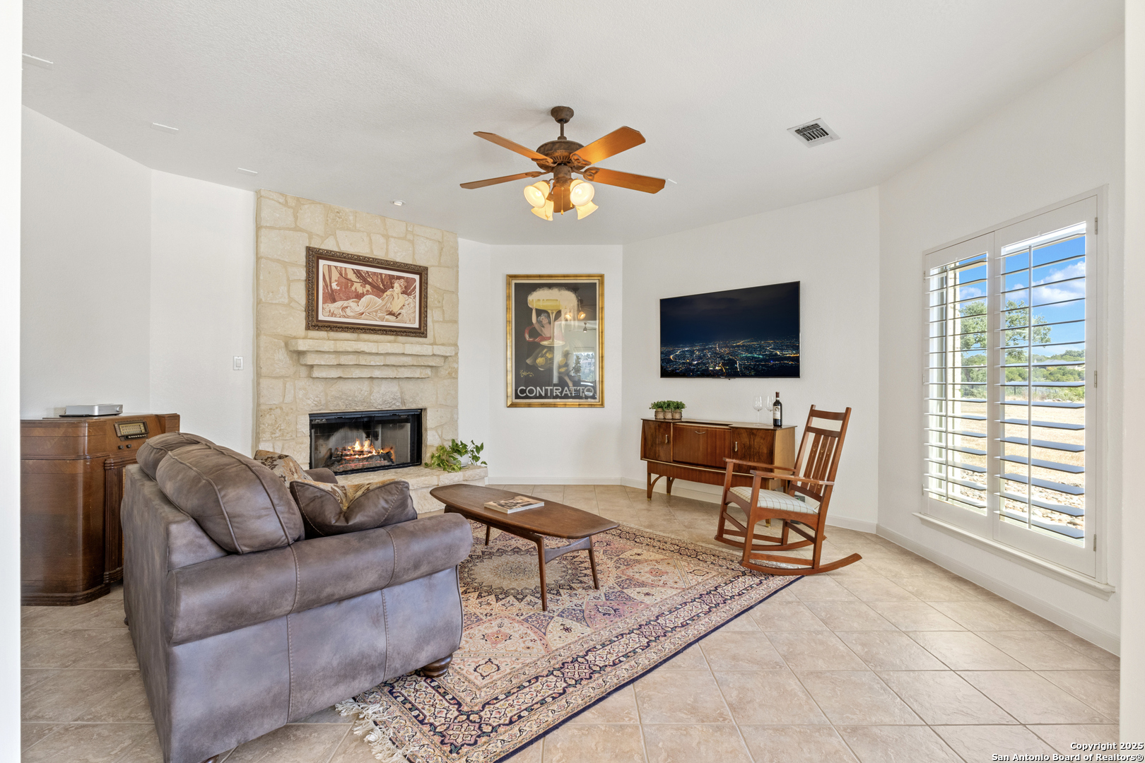 Add'l Living Room with fireplace and french doors