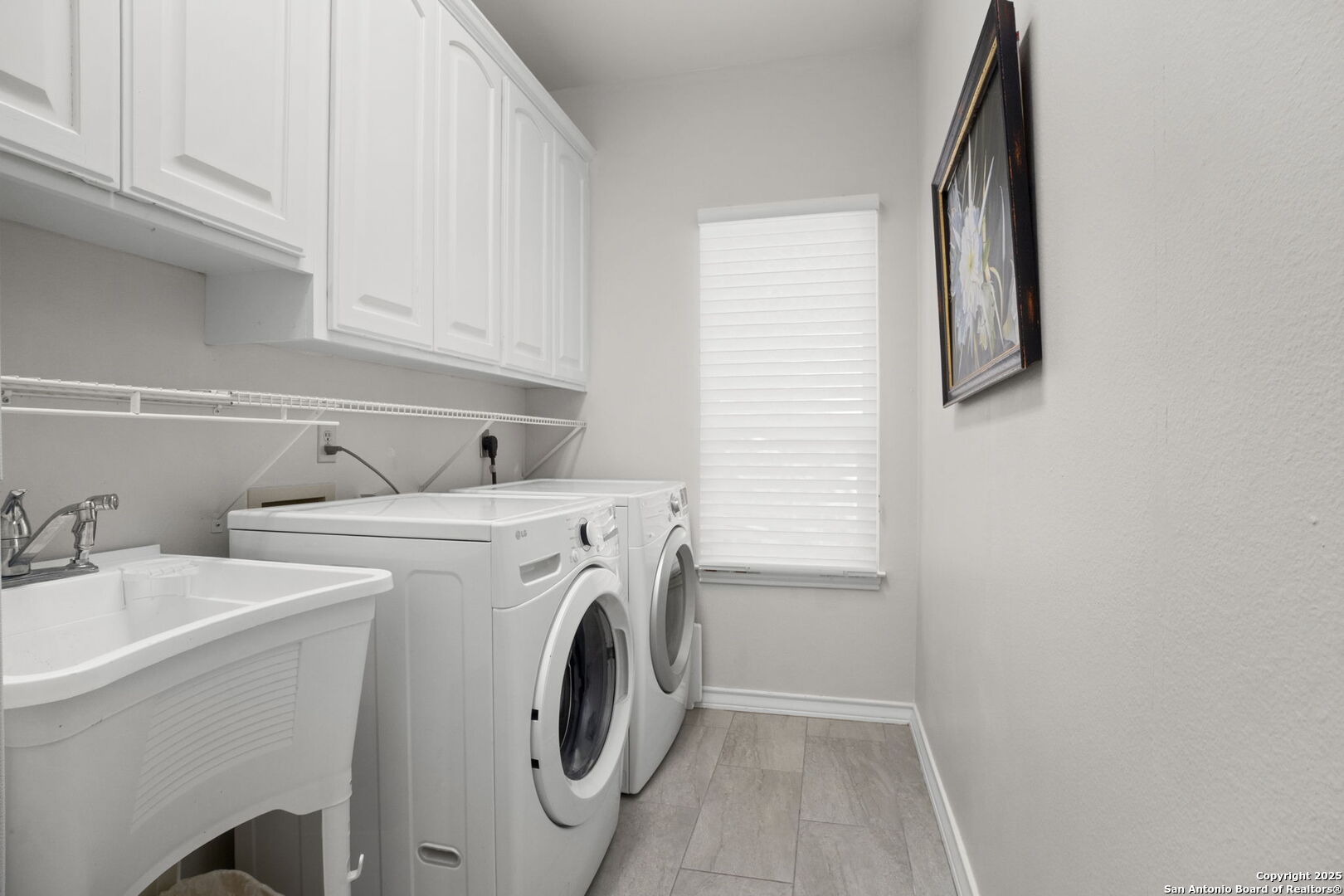 utility sink and room for a refrigerator/freezer