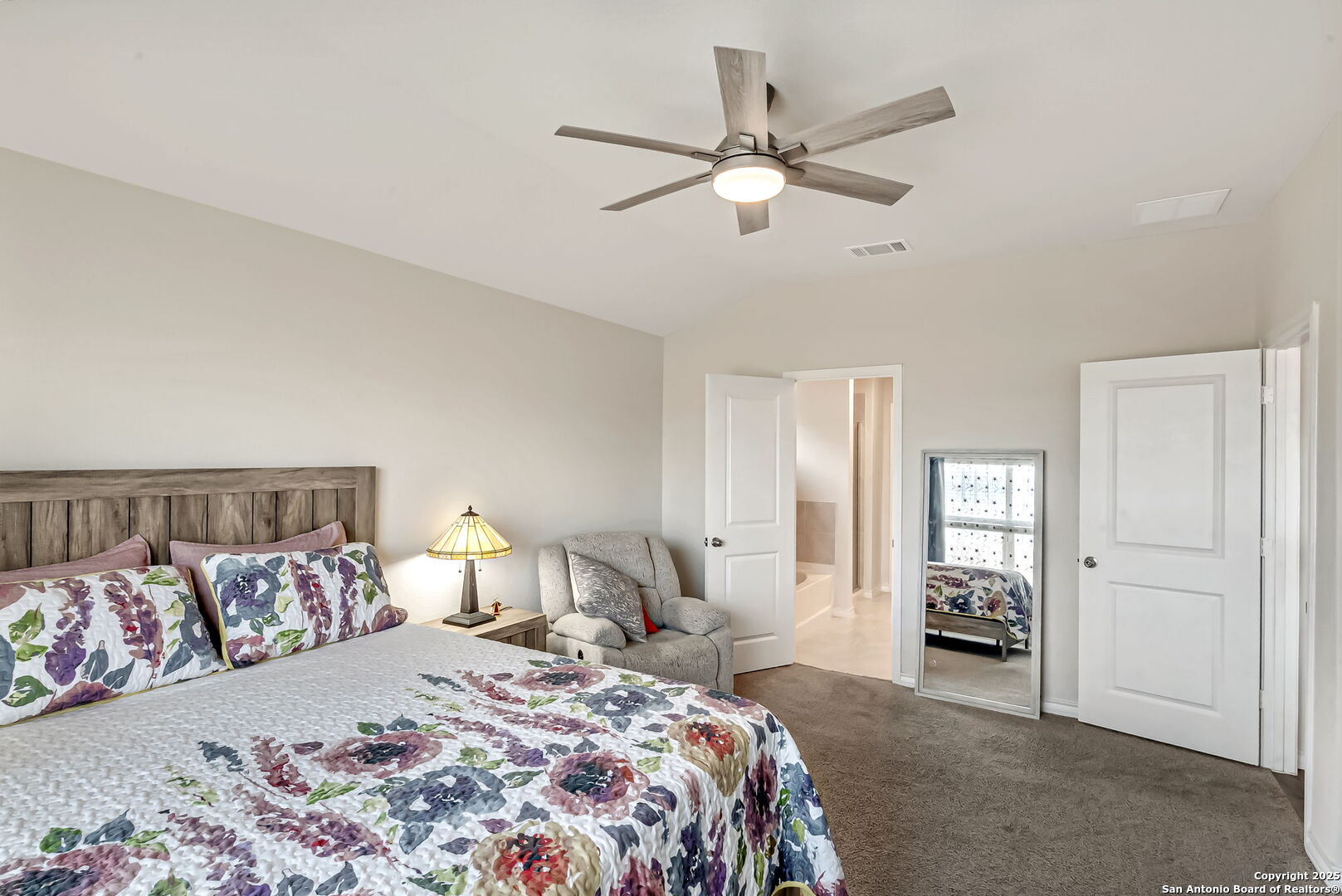 Primary bedroom to ensuite bathroom