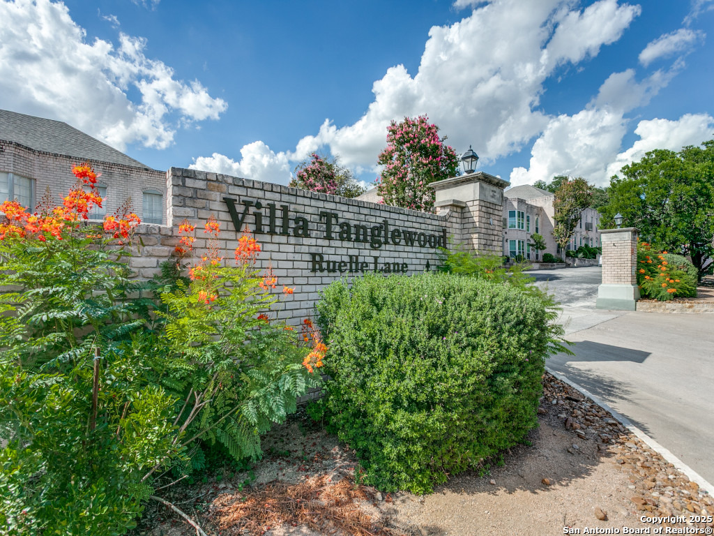 This 78209/AHISD condo is ideal for those wishing for updated living with the ability to walk to restaurants, retail shopping, and grocery stores. The design is townhome-style with entry on the first floor, one covered parking space immediately behind the unit off the patio, and both bedrooms upstairs with a half-bath downstairs. The floors are a beautiful rectangular tile (wood appearance) with white walls, white quartz counters, breakfast bar, and stainless appliances. The exposed brick wall and iron stair rails give that urban-living touch. This condo is sleek, updated, and in the heart of the city!
