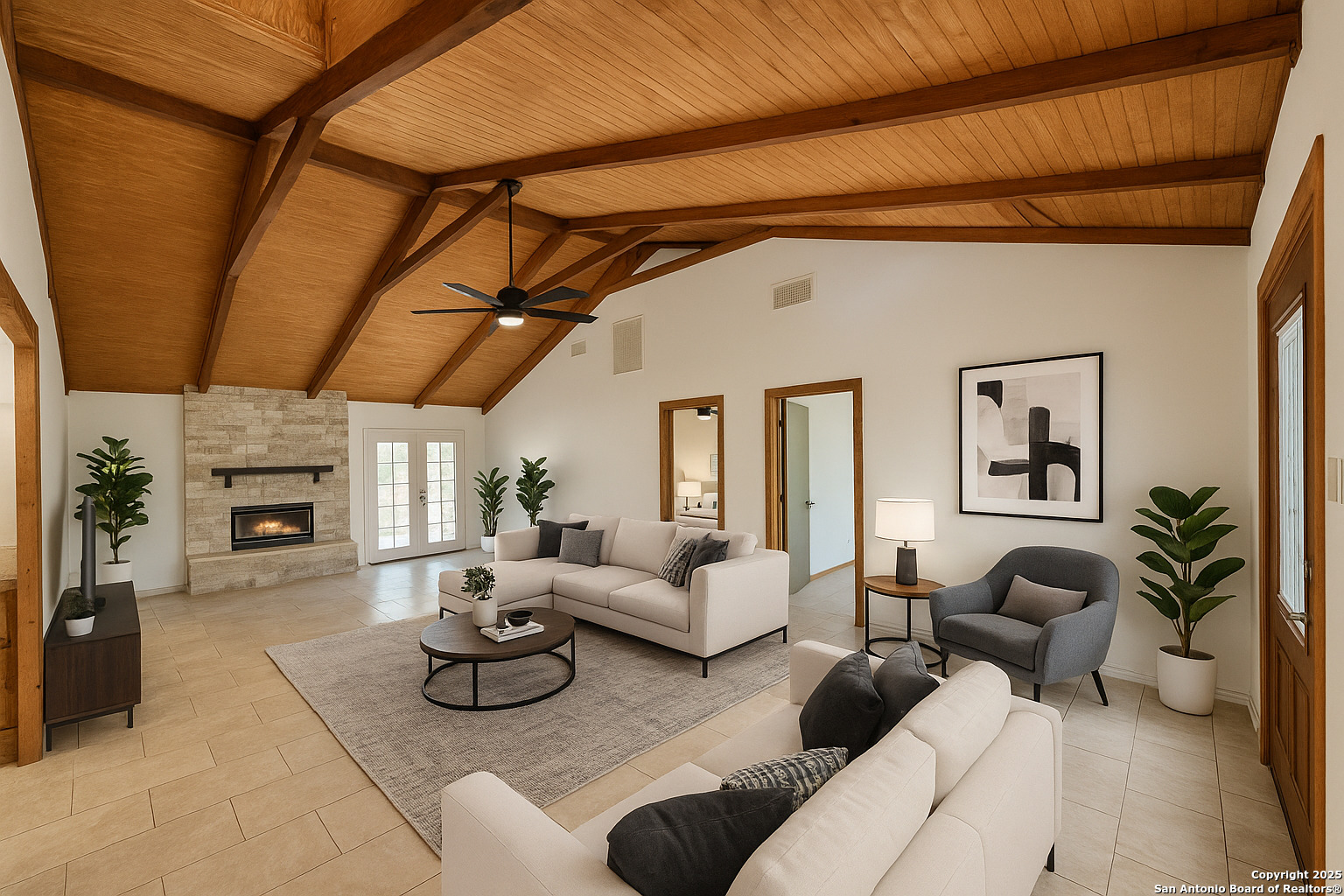 Great room w/ Cathedral ceilings virtually staged