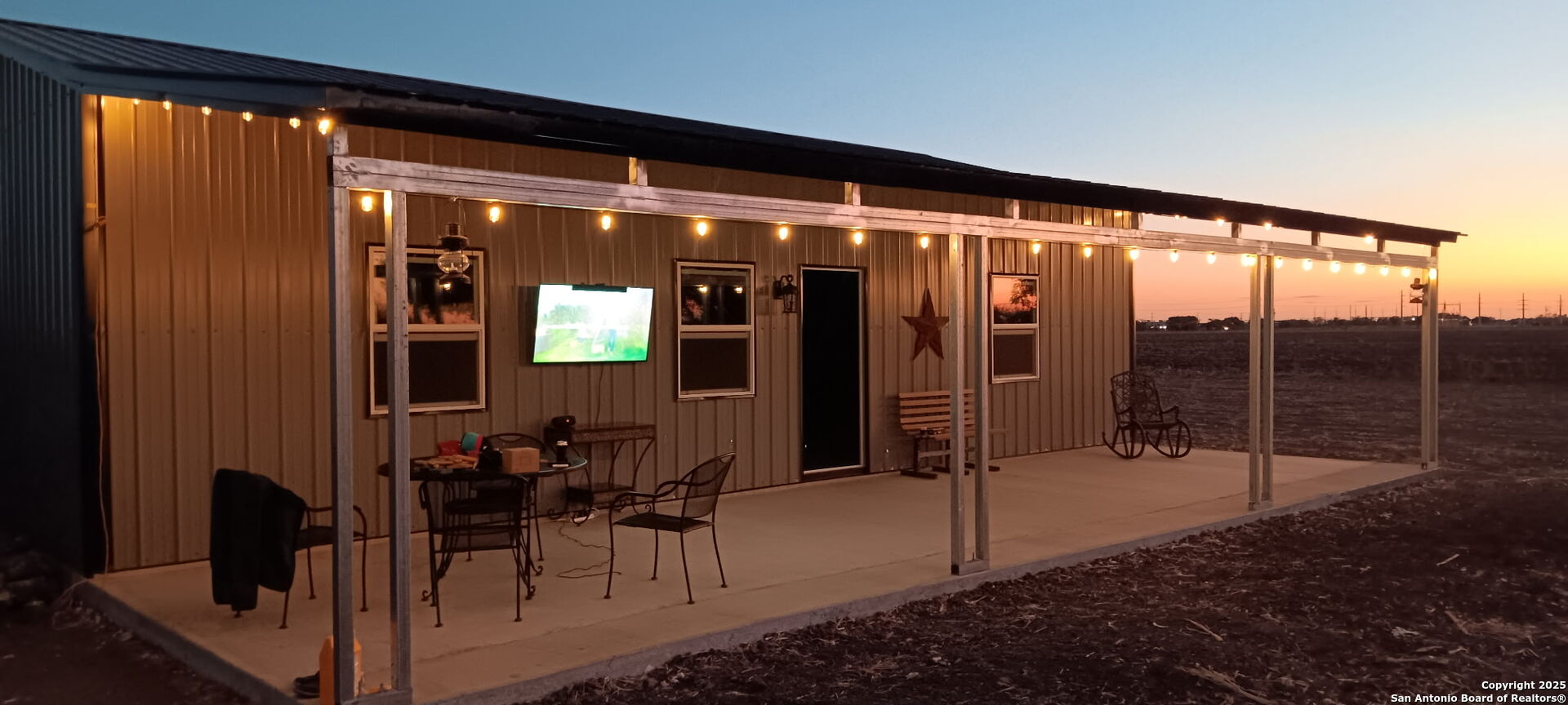 Front of home with sunset