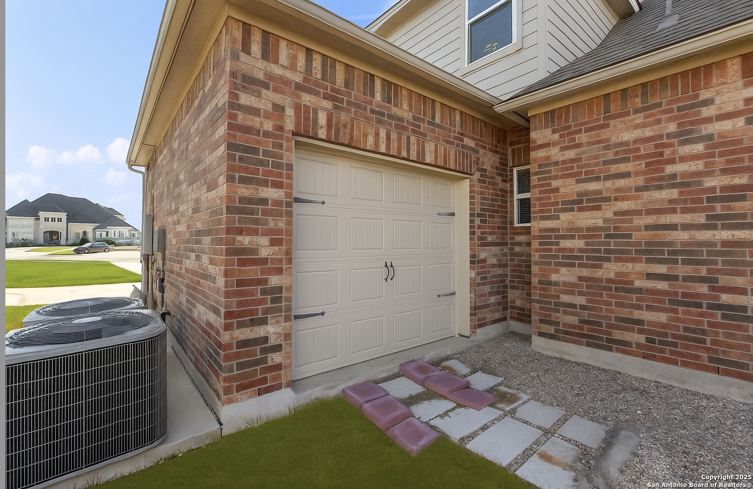 single roll-up door on backside of garage
