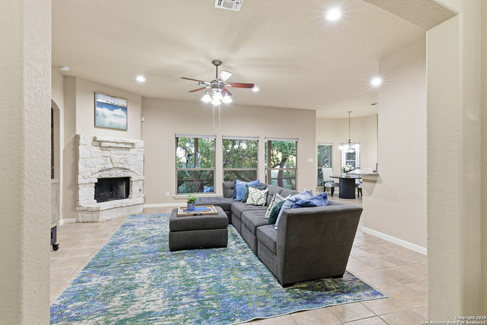 Massive living room with a wall of windows