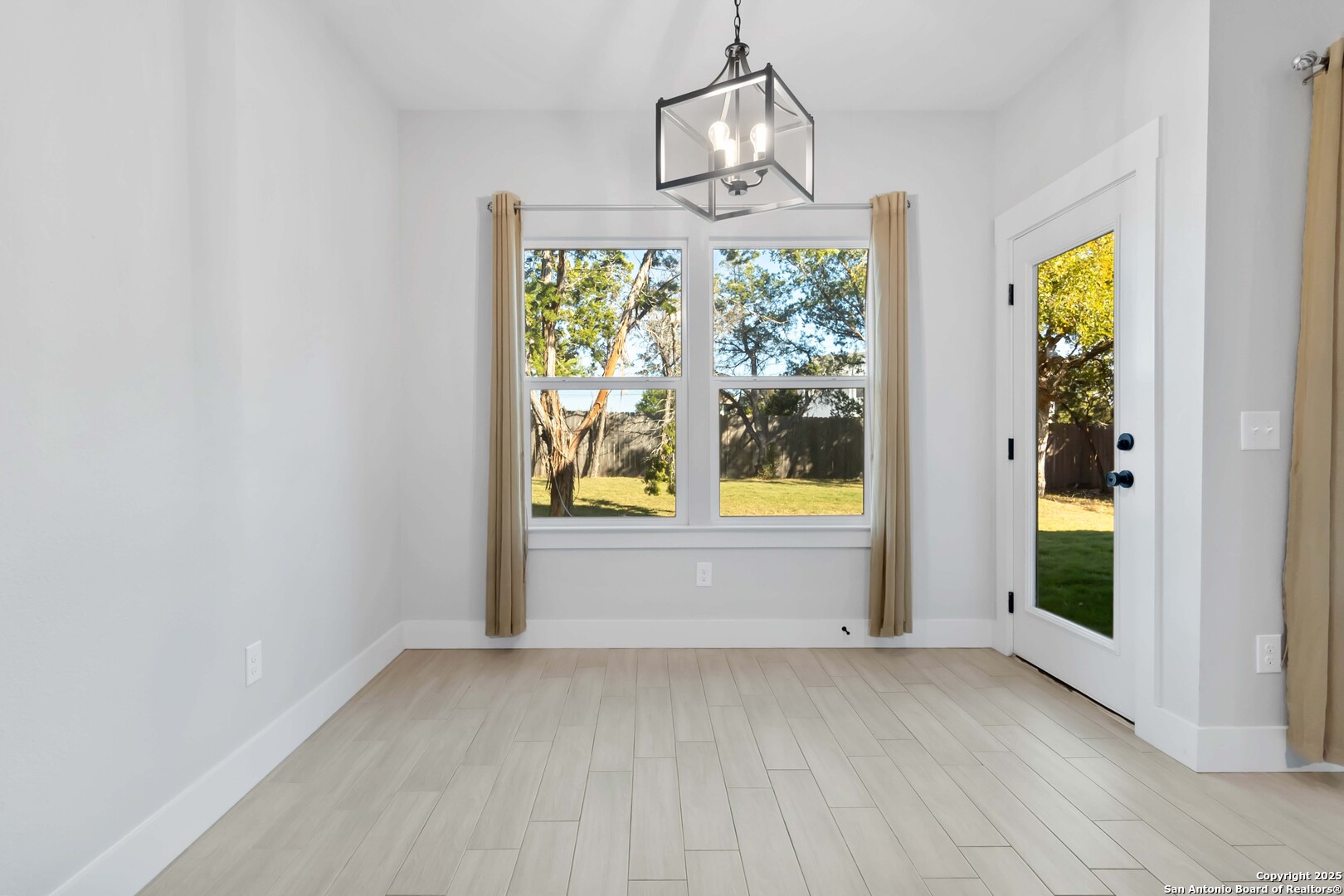 Informal Dining area leading to backyard