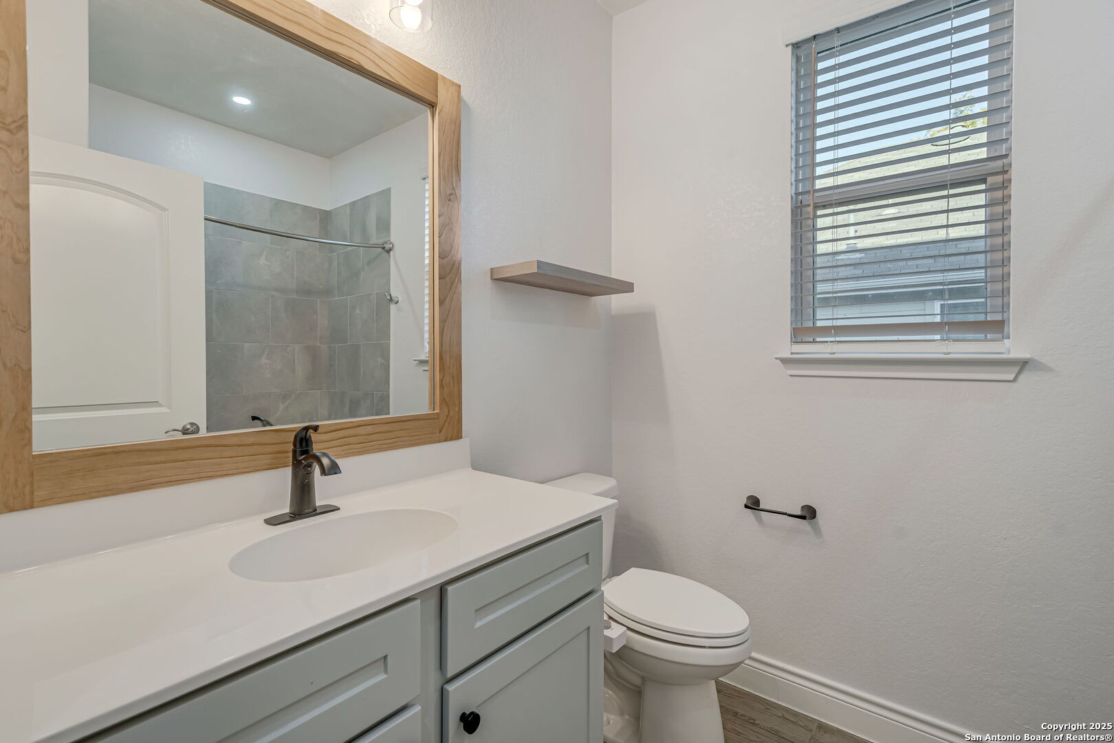 Secondary bathroom in-between secondary bedrooms