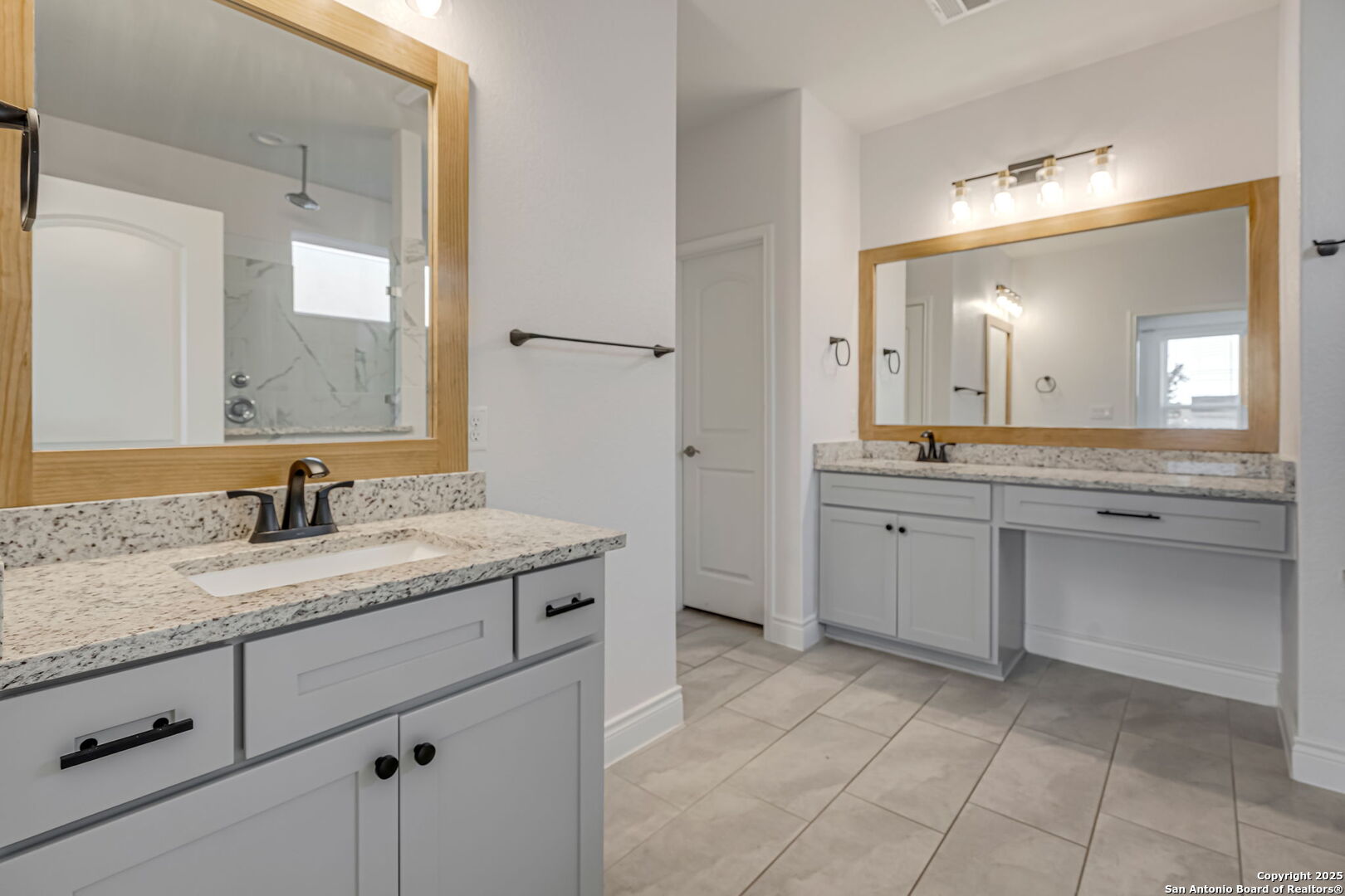 Dual split vanities in the en-suite primary bath