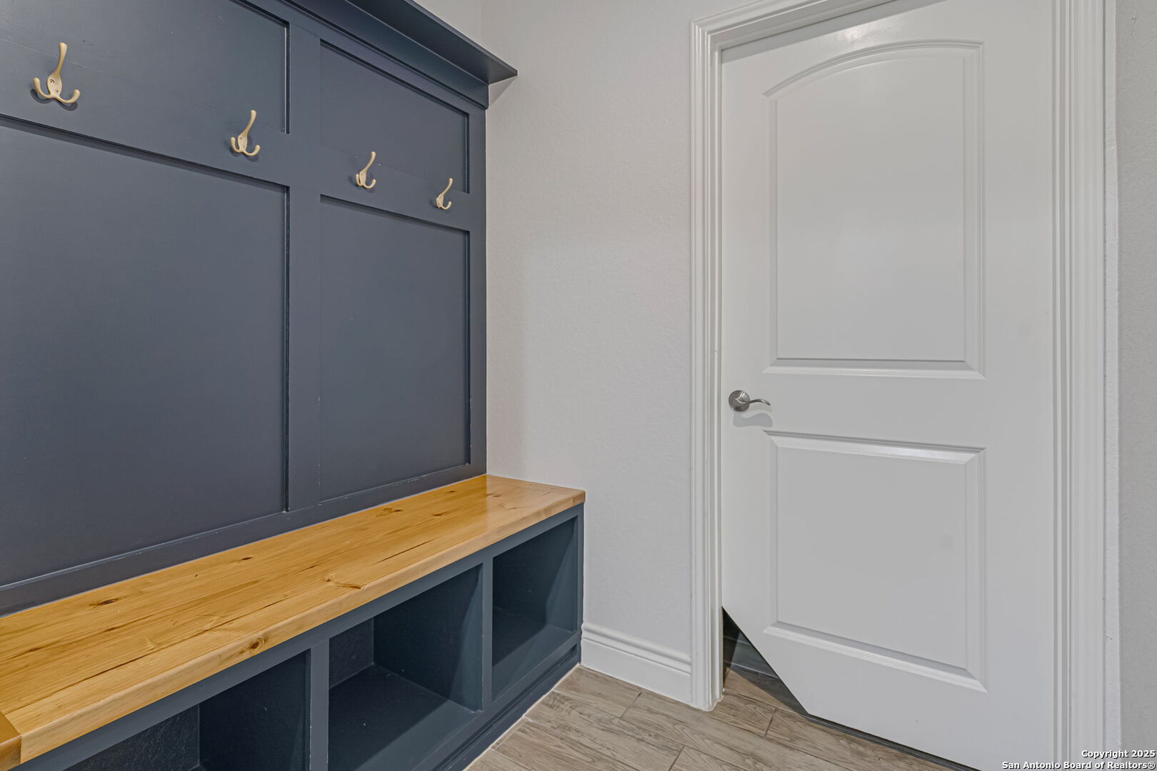 Mud room leading to the laundry room.