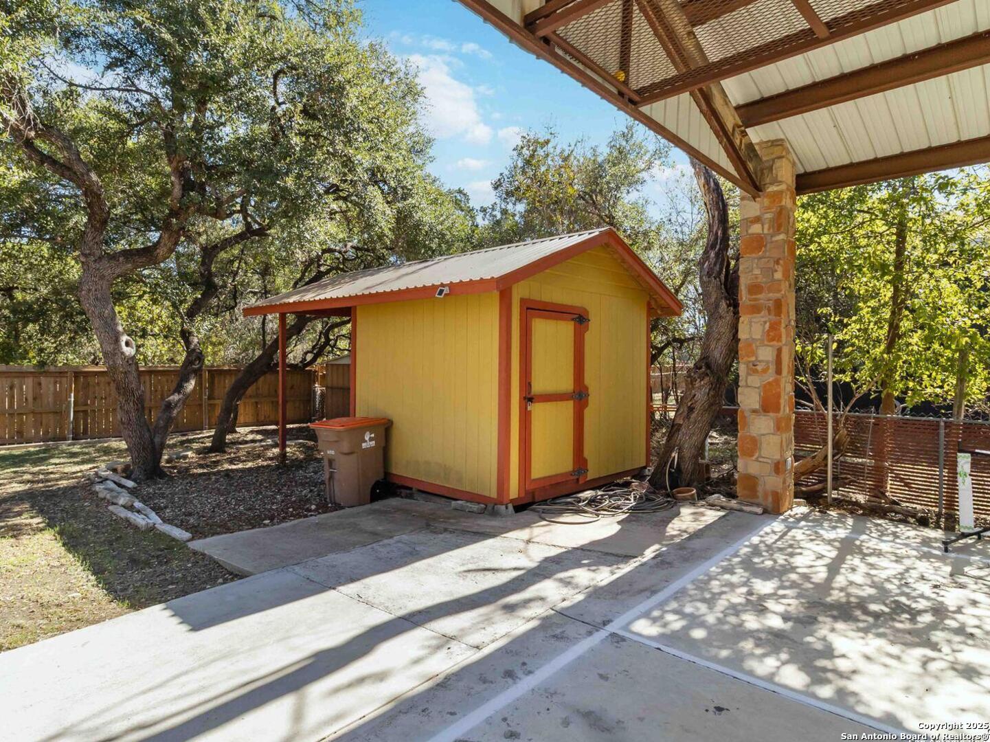 Storage shed will convey with the home.