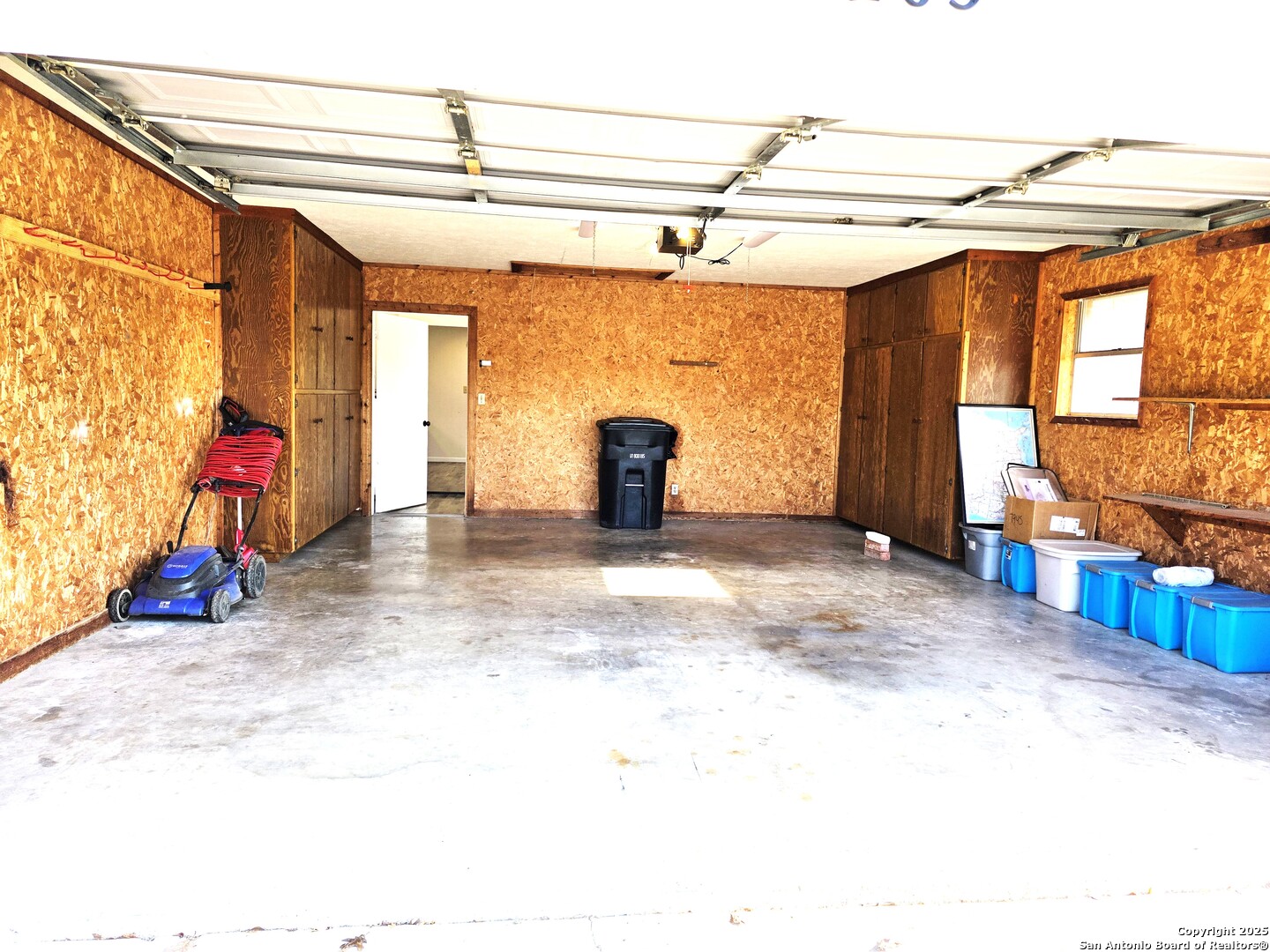2-car spacious garage with storage.